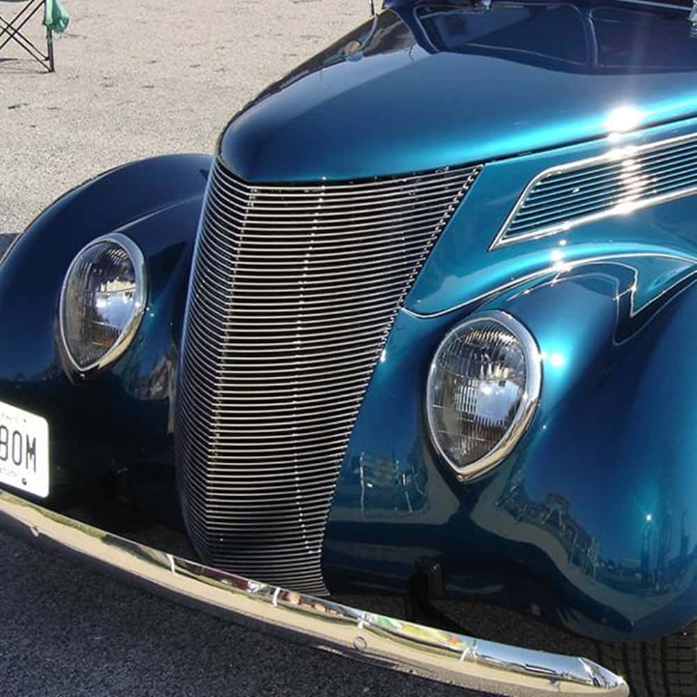 vintage teal car, gleaming front grille, round headlights, SD Desktop Wallpaper