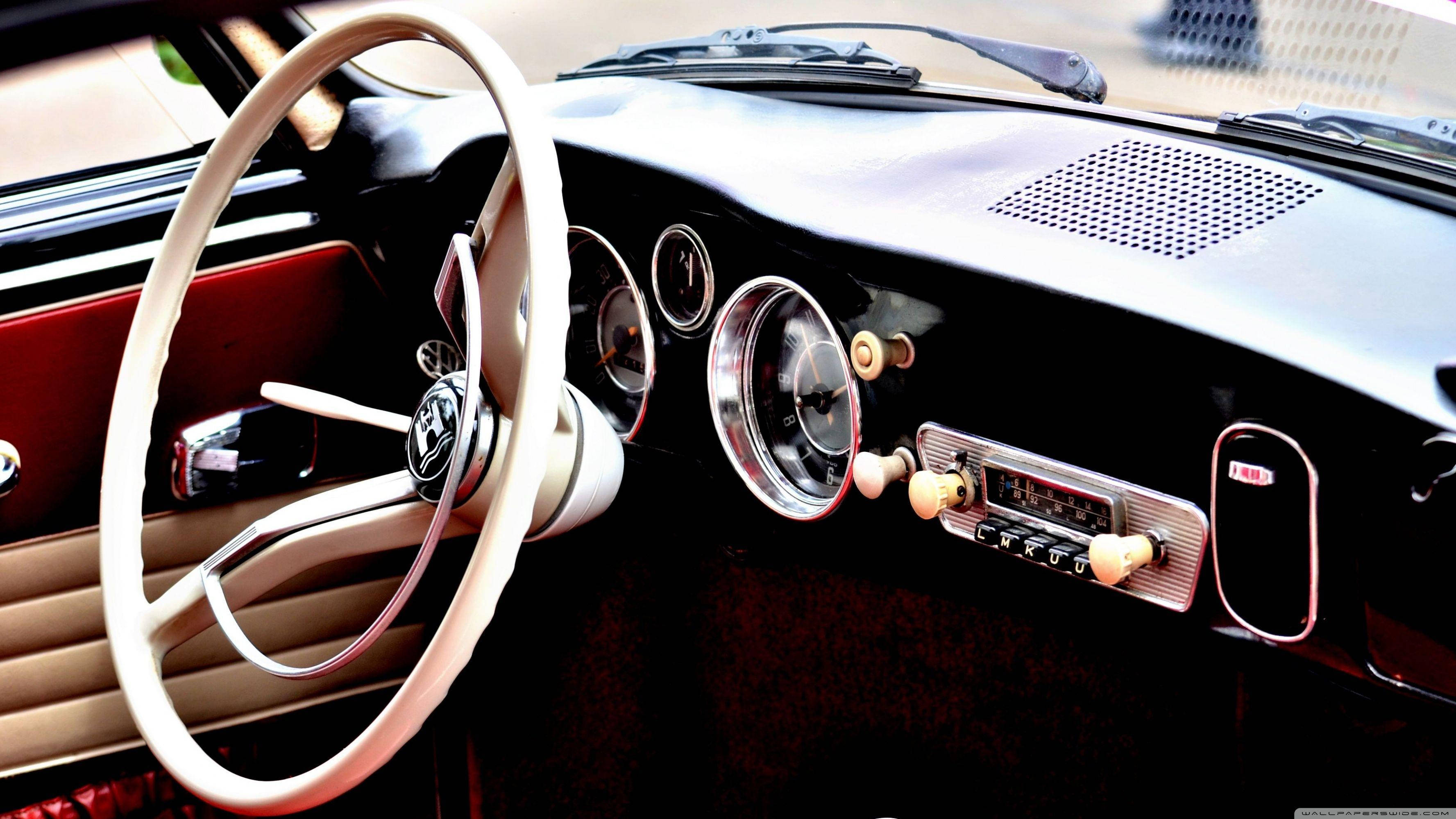 cream steering wheel, chrome gauges, wooden radio knobs, 2K Desktop Wallpaper
