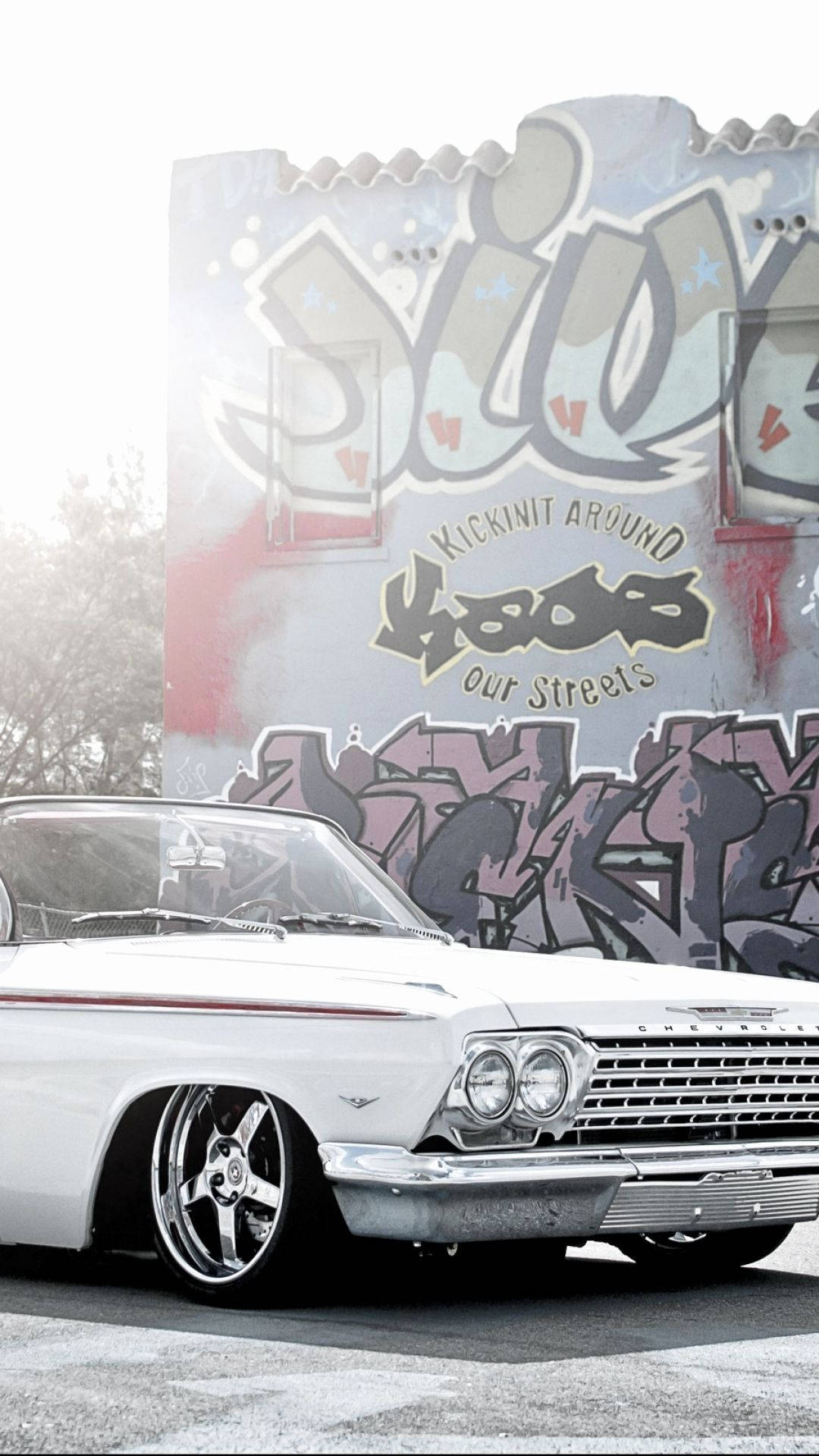 white classic car, custom chrome wheels, graffiti-covered building, Full HD Phone Wallpaper