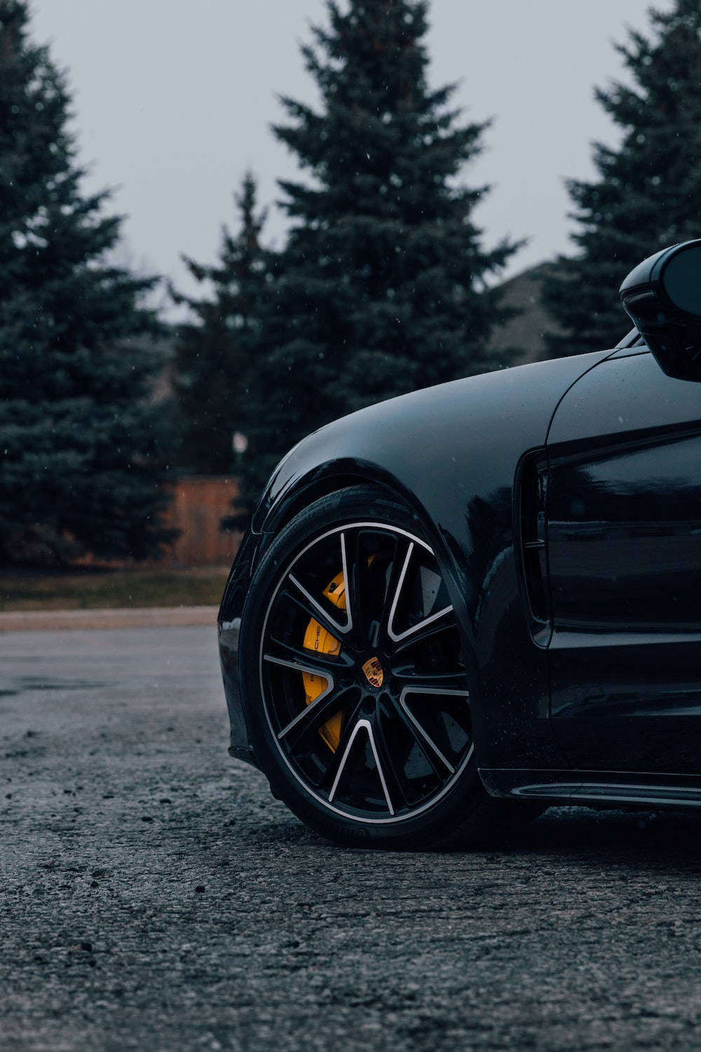 black sports car, yellow brake calipers, wet pavement, HD Phone Wallpaper
