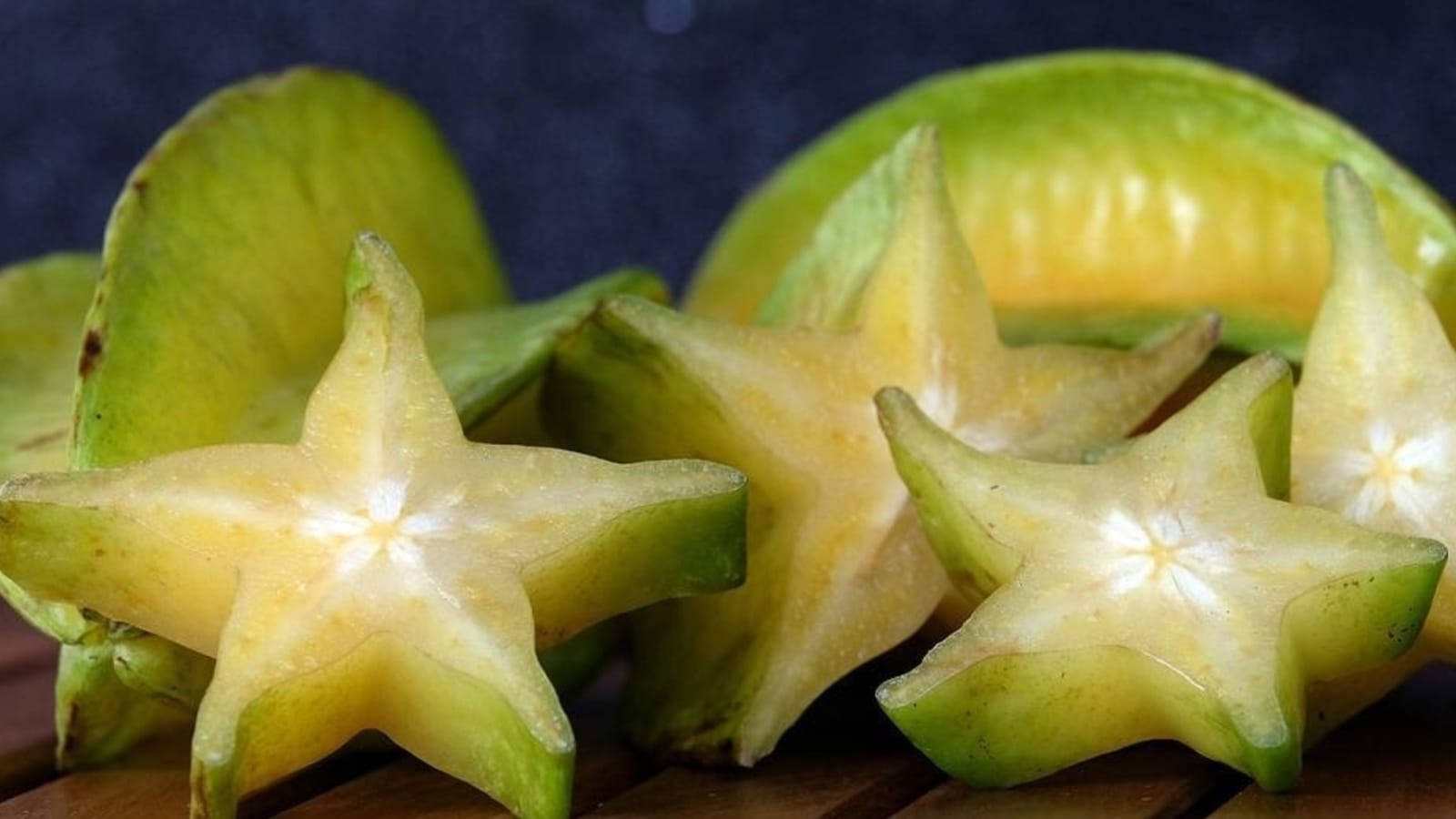 green carambola, star-shaped slices, vibrant yellow star-shaped flesh, HD Desktop Wallpaper