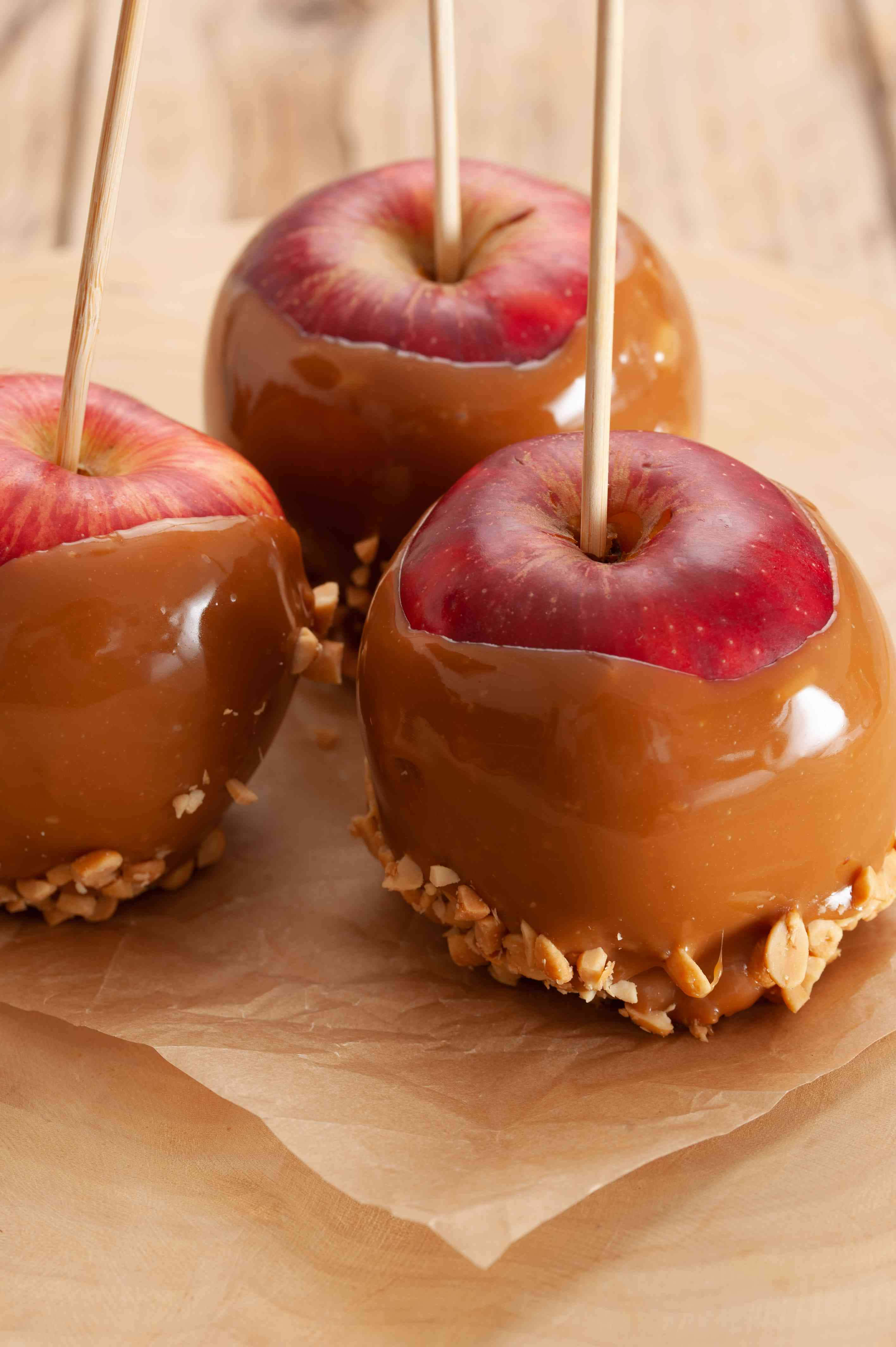 caramel apples, glossy caramel apples, peanut topping, 4K Phone Wallpaper