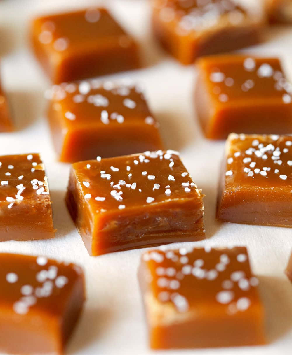 brown caramel swirls, golden caramel squares, coarse salt, SD Phone Wallpaper
