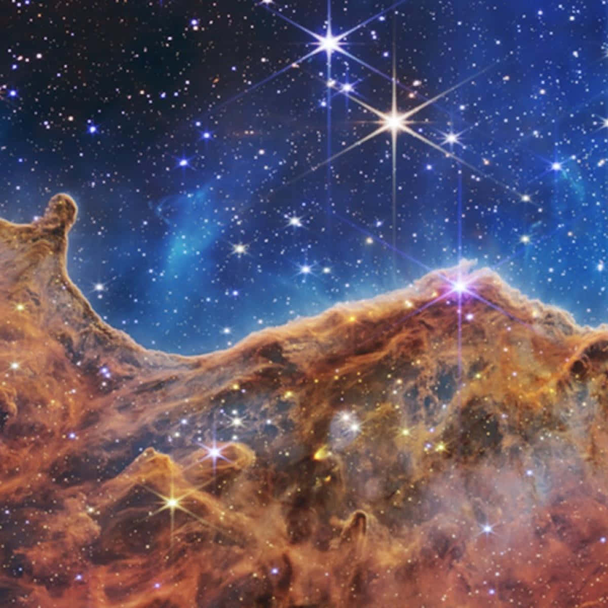 Carina Nebula, glowing orange clouds, bright stars, SD Desktop Wallpaper