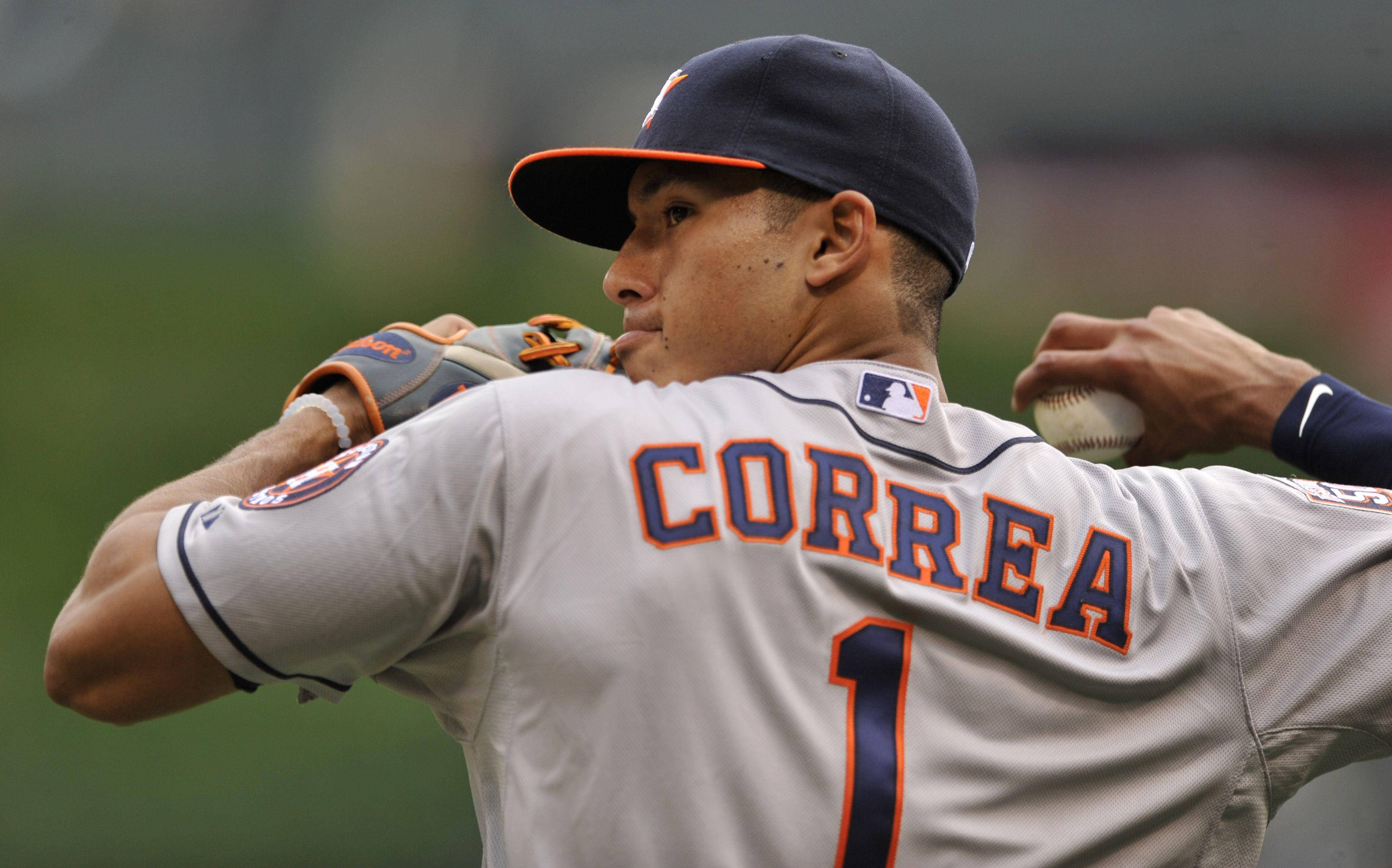 Carlos Correa, gray uniform, winds up for a pitch, 2K Desktop Wallpaper
