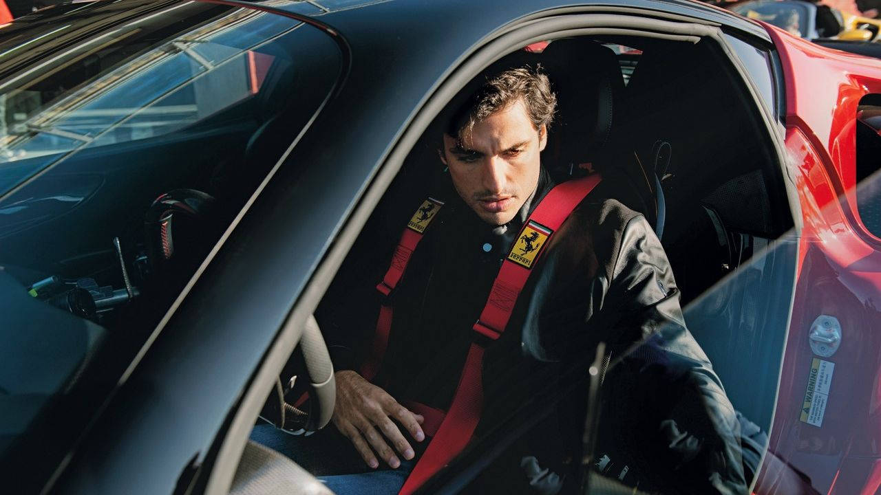 Carlos Sainz Jr, black racing suit, red Ferrari harness, HD Desktop Wallpaper