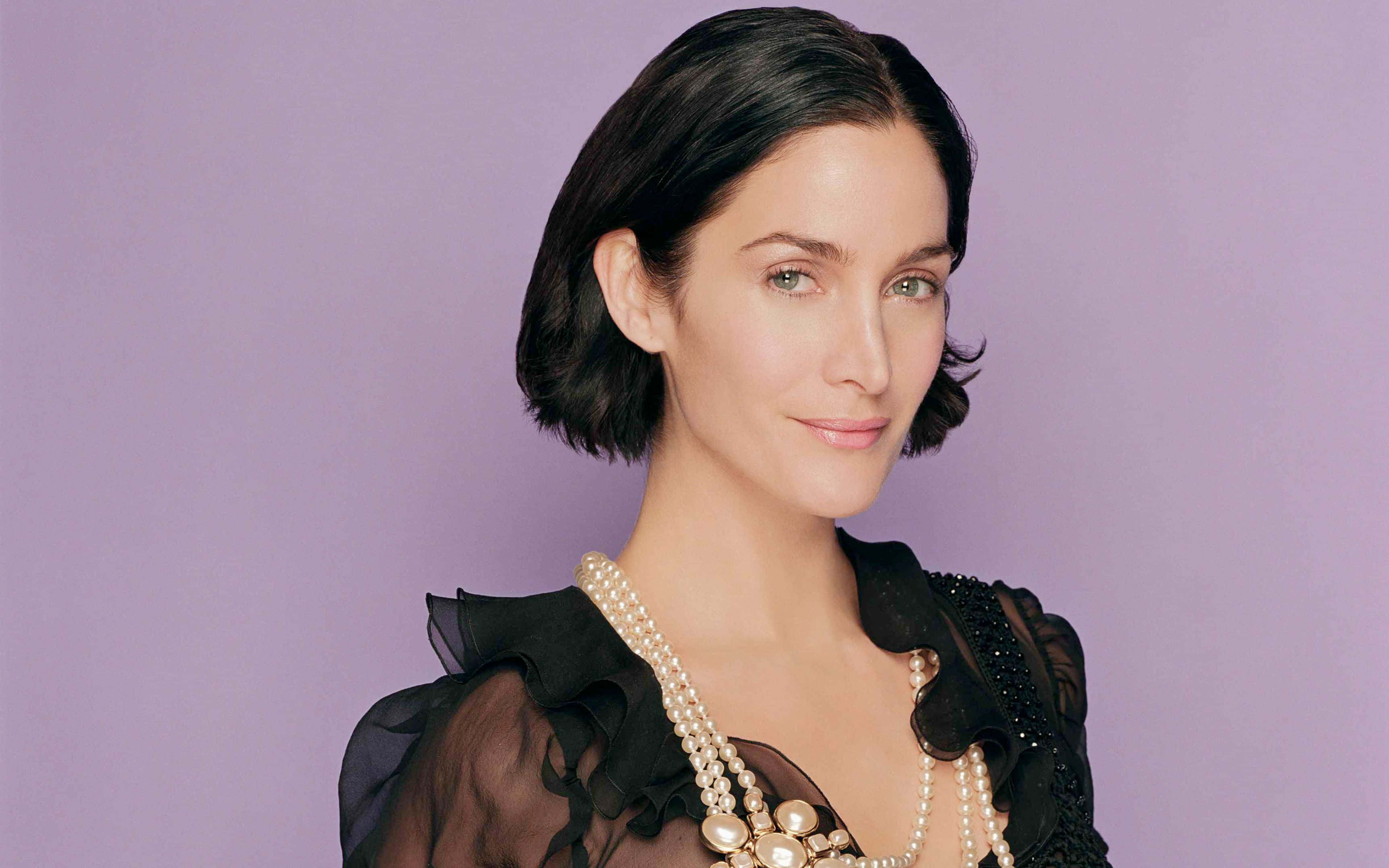 Carrie Anne Moss, black ruffled top, pearl necklaces, 4K Desktop Wallpaper