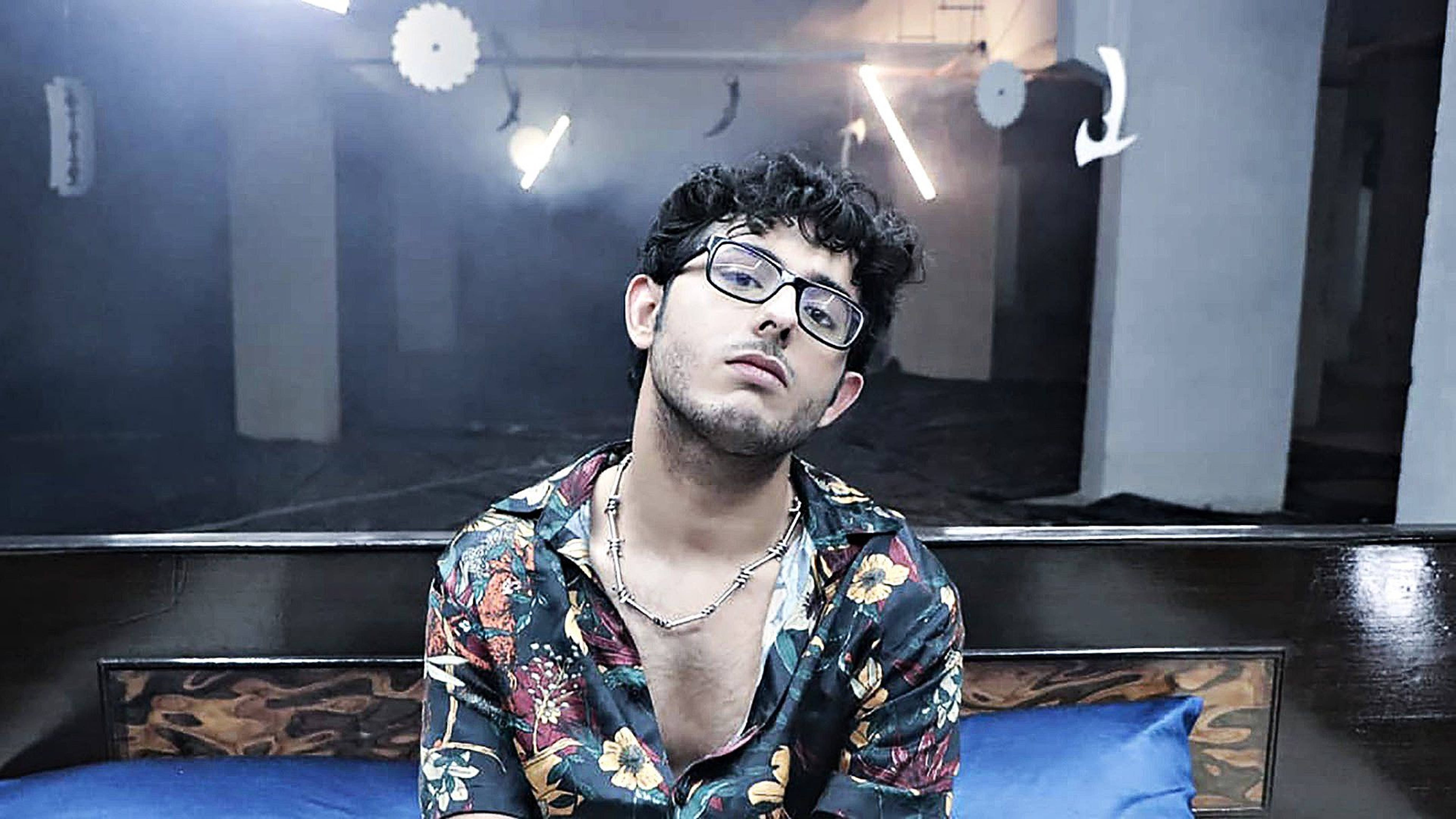Carryminati, floral shirt, blue couch, 5K Desktop Wallpaper
