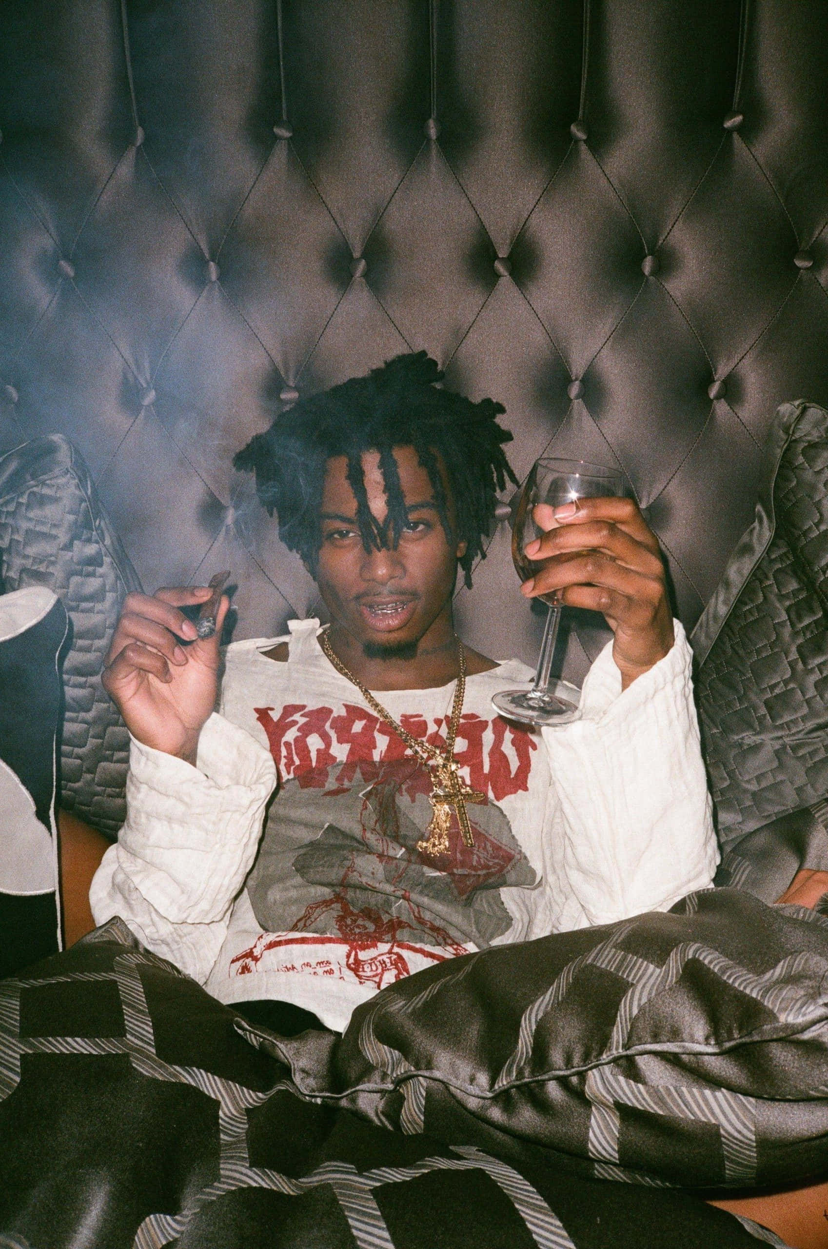 Carti Pfp, dreadlocks, tufted leather couch, 2K Phone Wallpaper