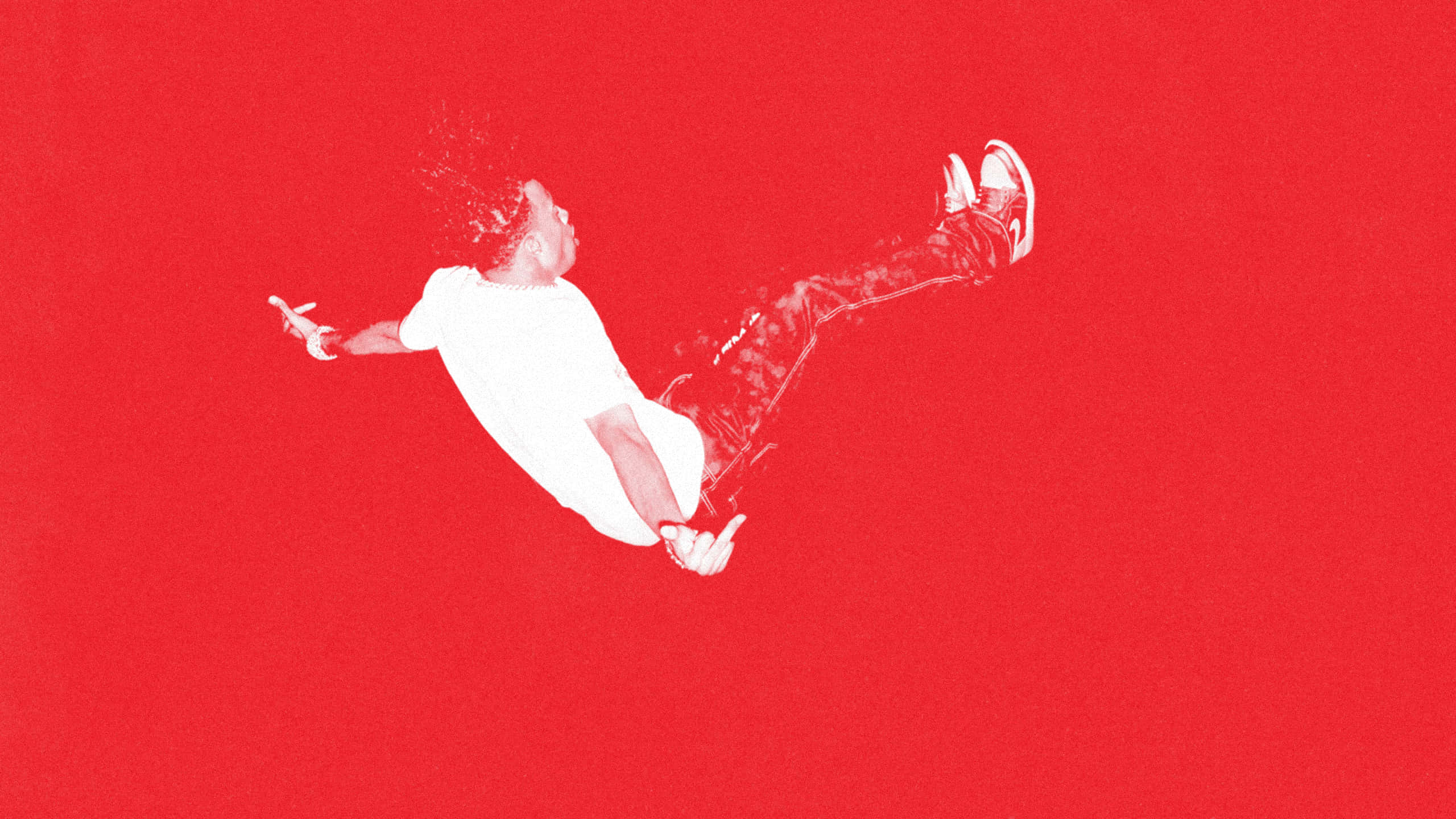 Carti, red background, mid-air, 2K Desktop Wallpaper