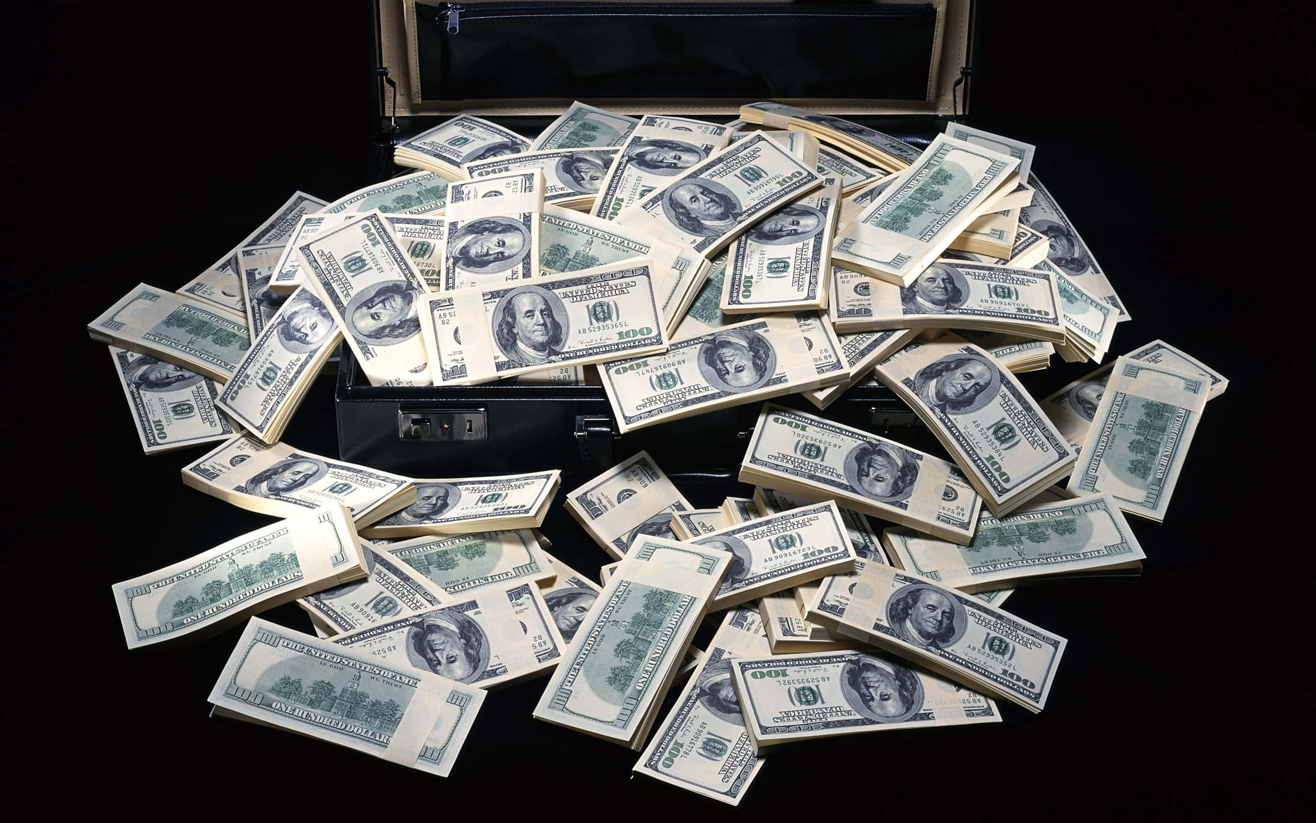 black briefcase, one hundred dollar bills, dark background, 2K Desktop Wallpaper