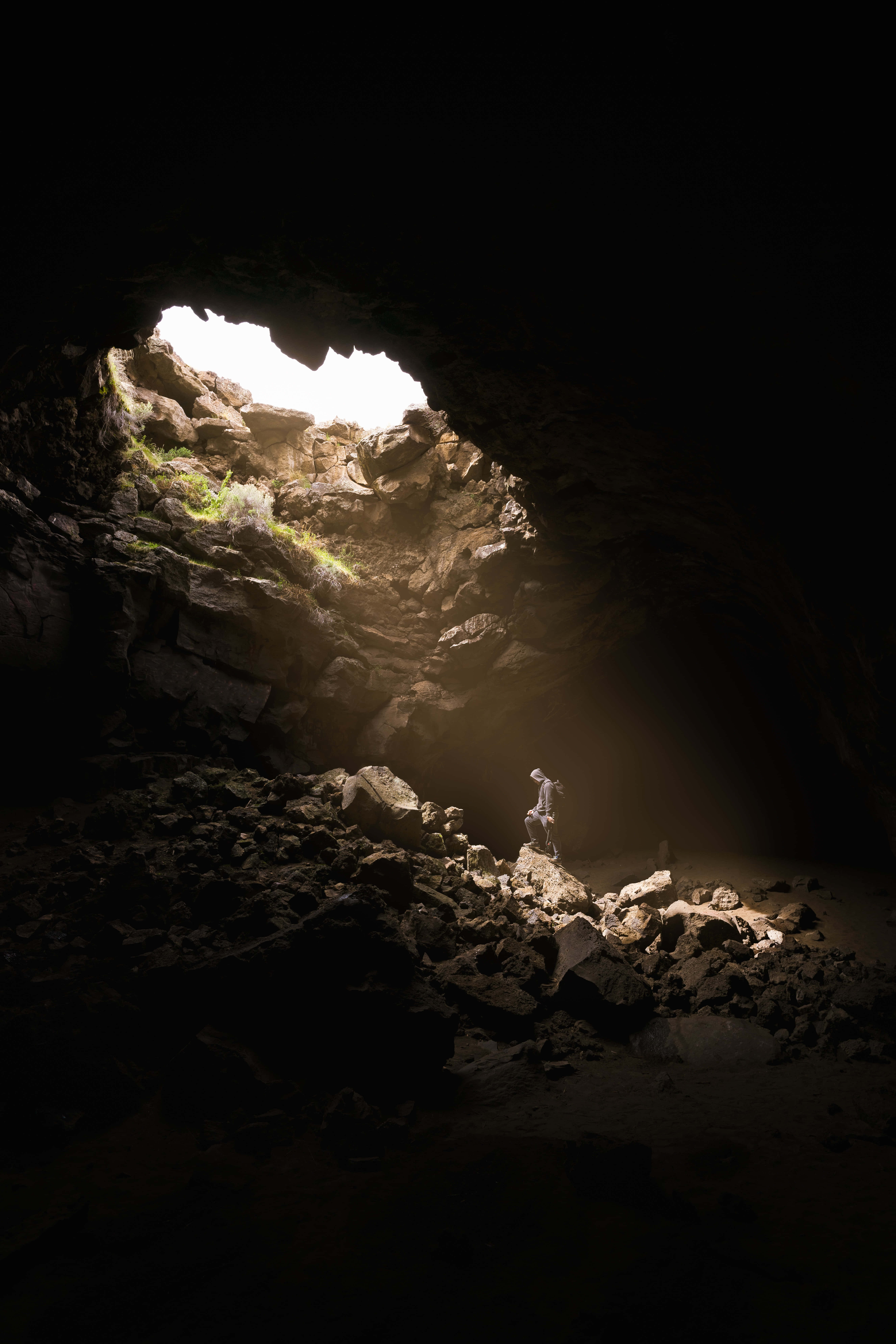 cave, lone hiker, bright sunlight, 8K Phone Wallpaper