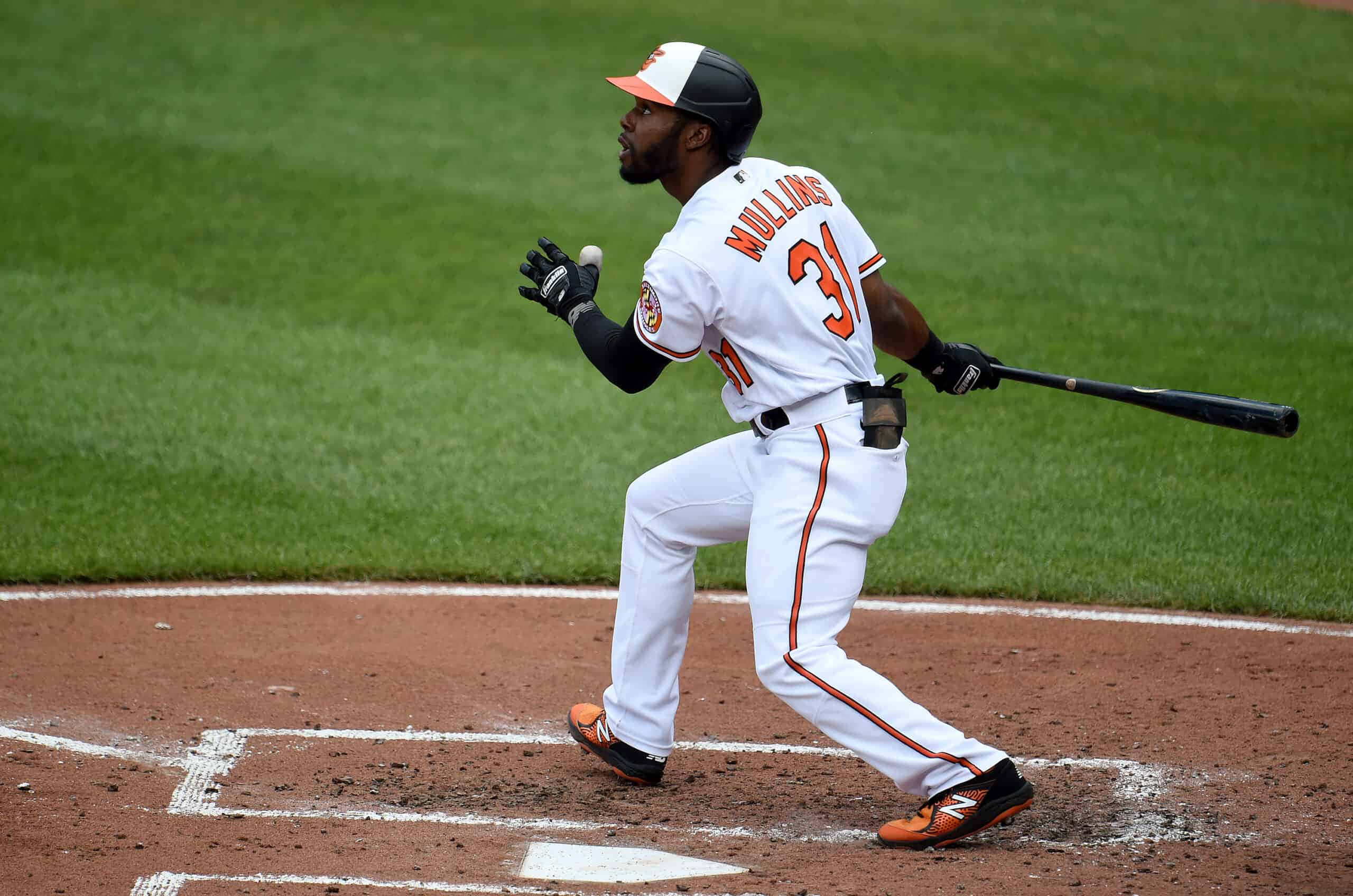 Cedric Mullins, white and orange uniform, batting action, 2K Desktop Wallpaper