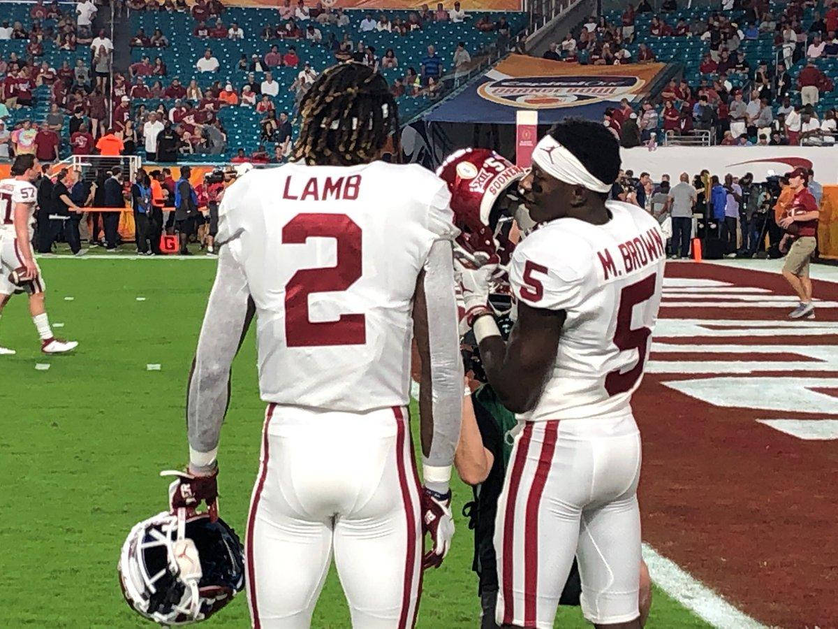 Ceedee Lamb, white and red uniforms, lit field, SD Desktop Wallpaper