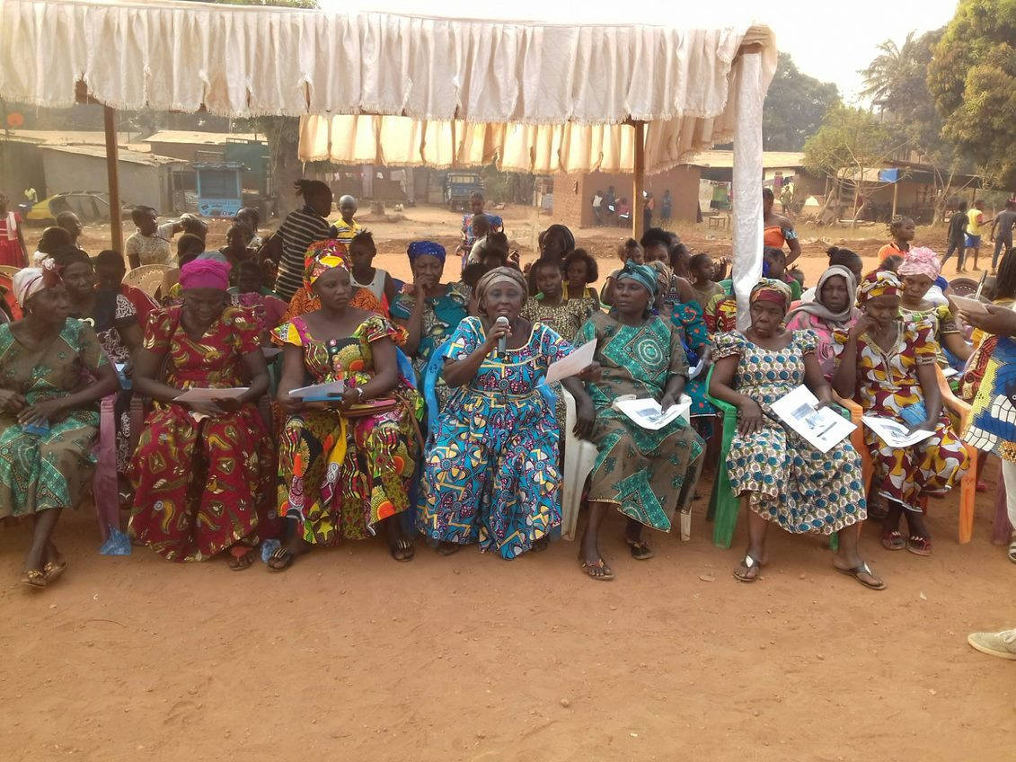 Central African Republic, vibrant patterned dresses, white canopy, SD Desktop Wallpaper