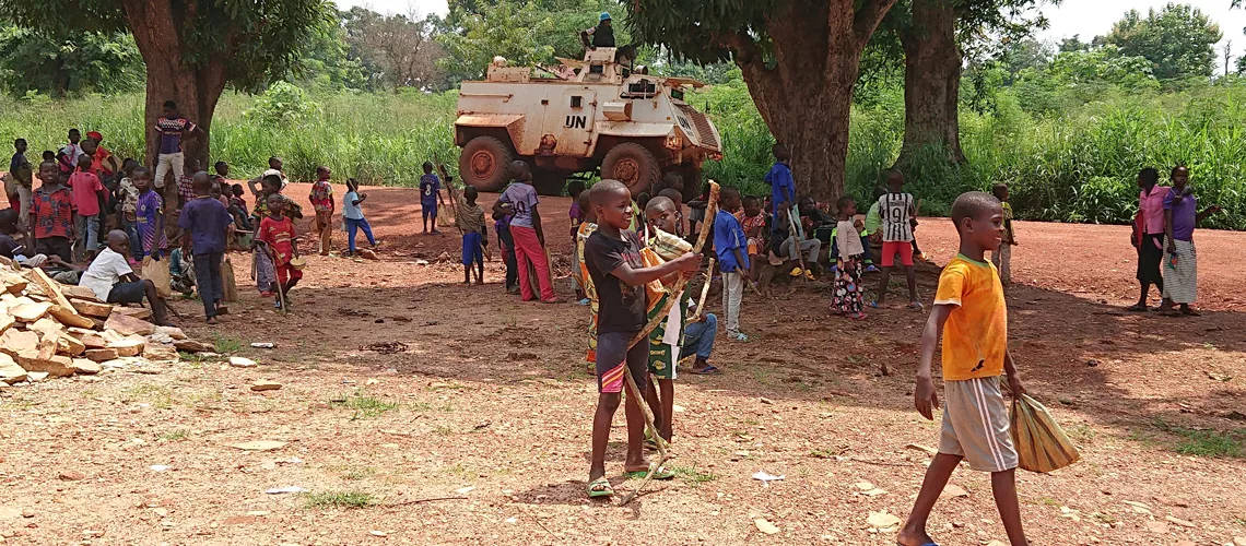 Central African Republic, UN armored vehicle, large trees, SD Desktop Wallpaper