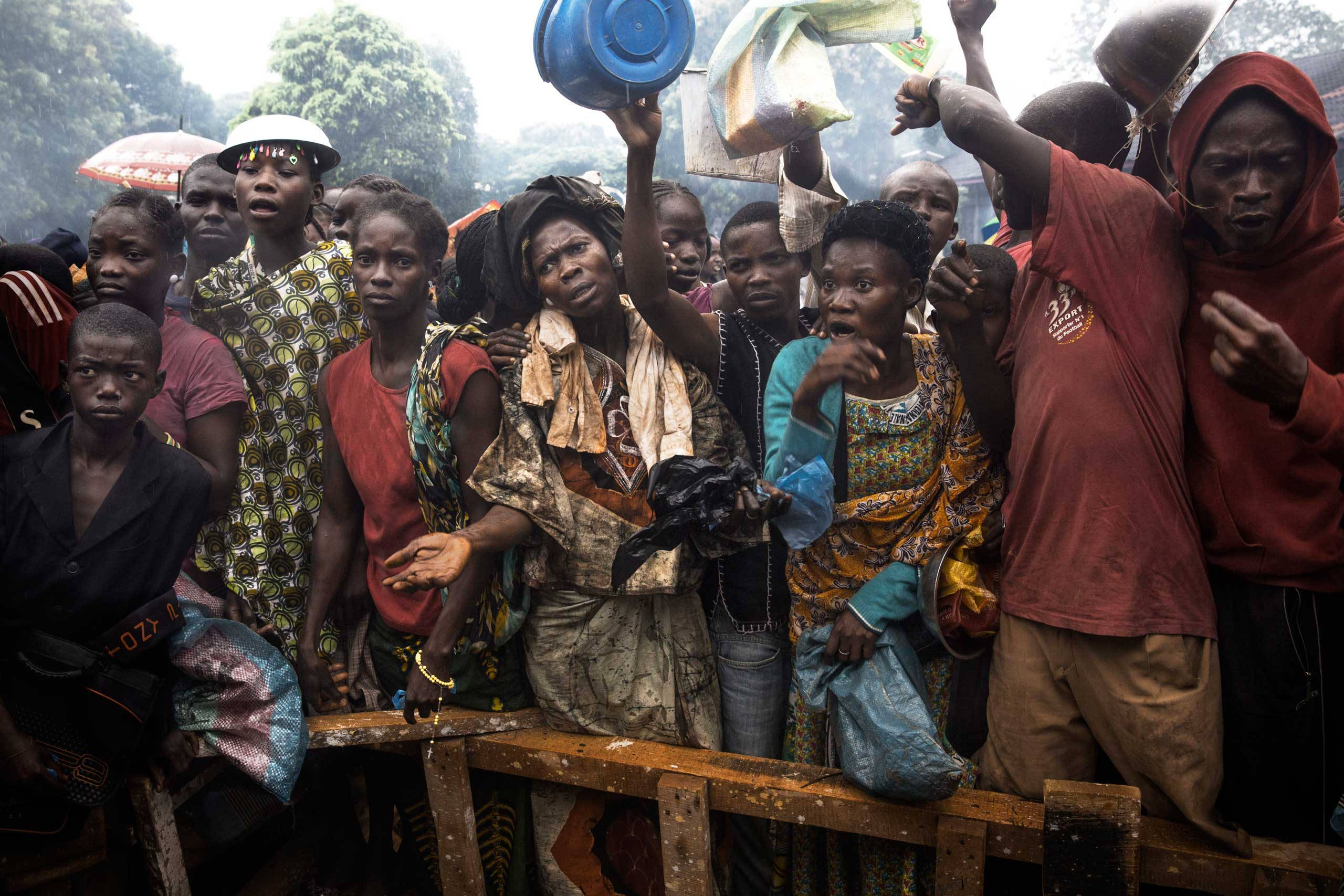 protesting people, Central African Republic, vibrant patterned clothing, 2K Desktop Wallpaper