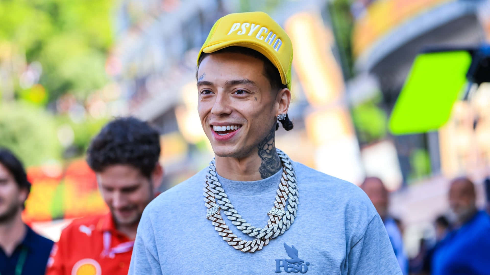 Central Cee, yellow 'PSYCHO' cap, thick silver chains, Full HD Desktop Wallpaper