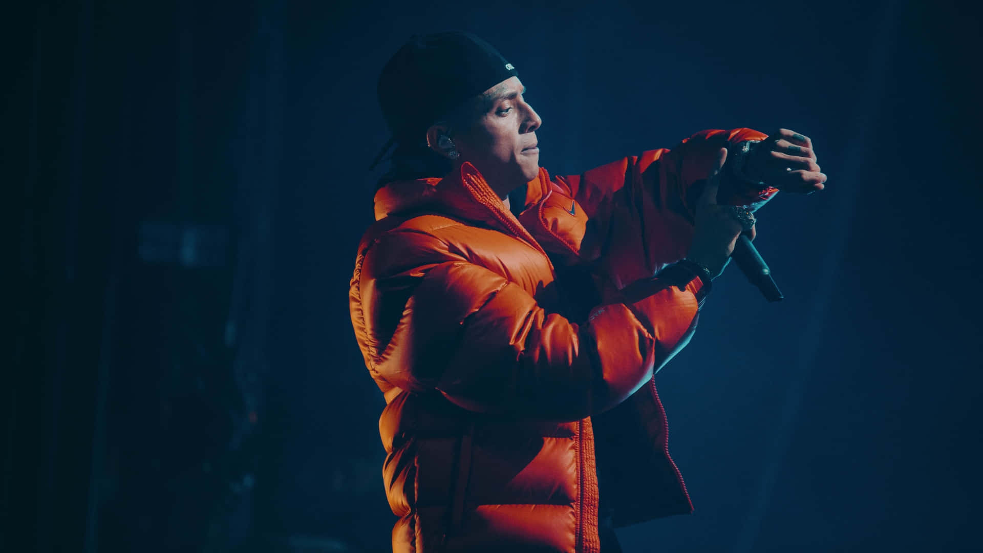Central Cee, bright orange puffer jacket, black cap, Full HD Desktop Wallpaper