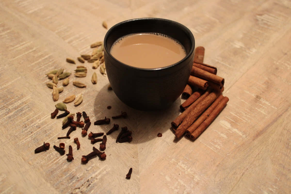 chai, black cup, wooden surface, SD Desktop Wallpaper