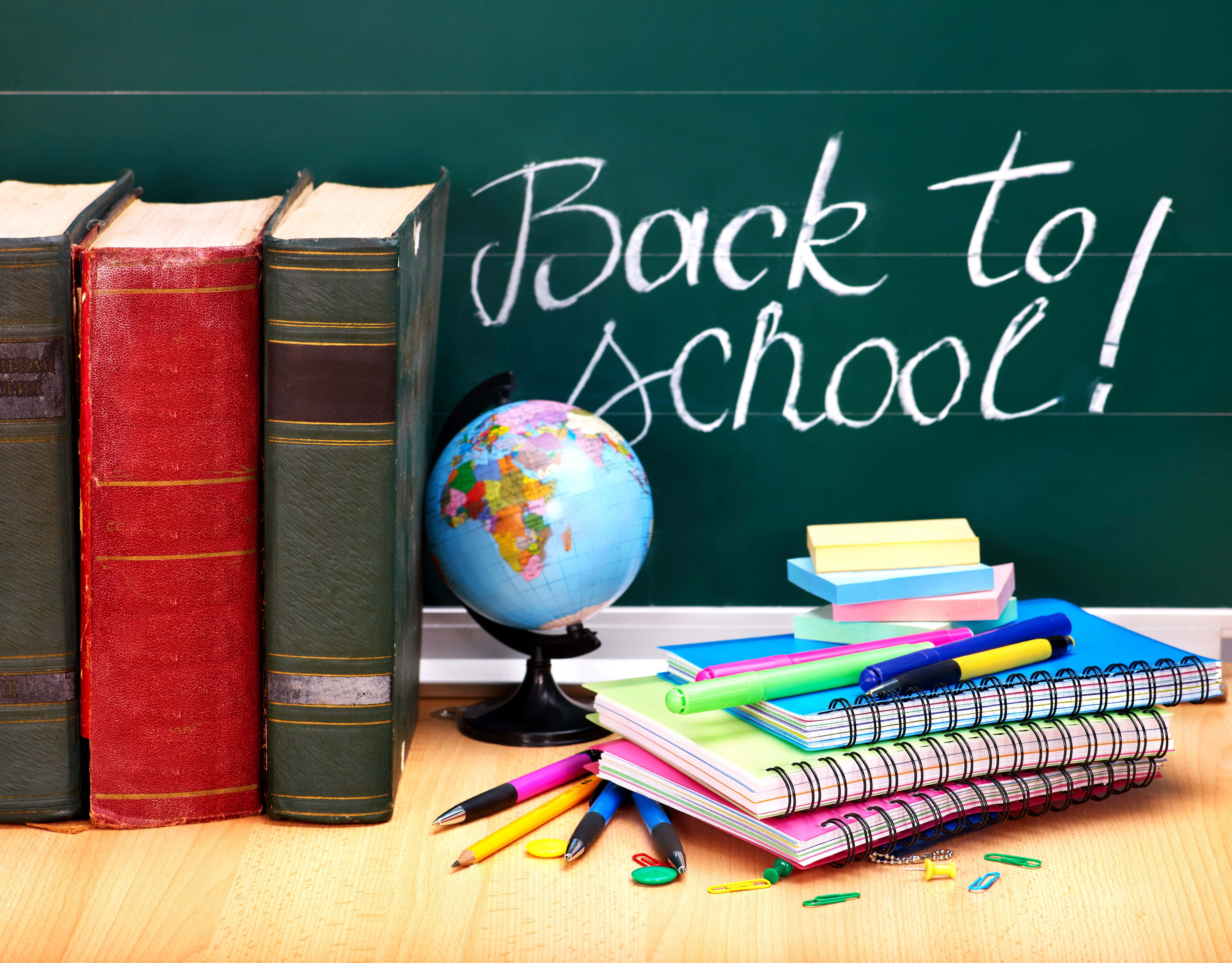chalkboard, wooden desk, colorful notebooks, 4K Desktop Wallpaper