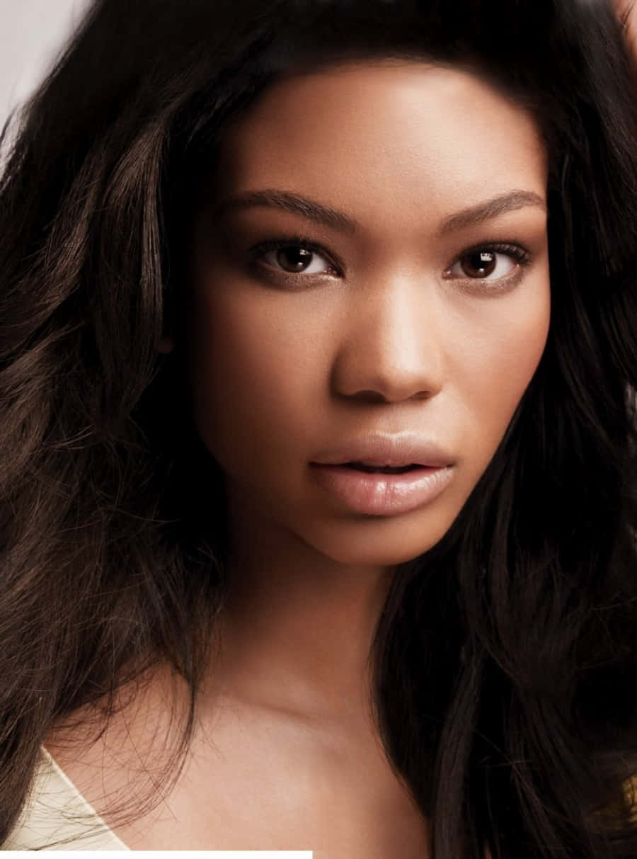 Chanel Iman, dark wavy hair, soft lighting, SD Phone Wallpaper