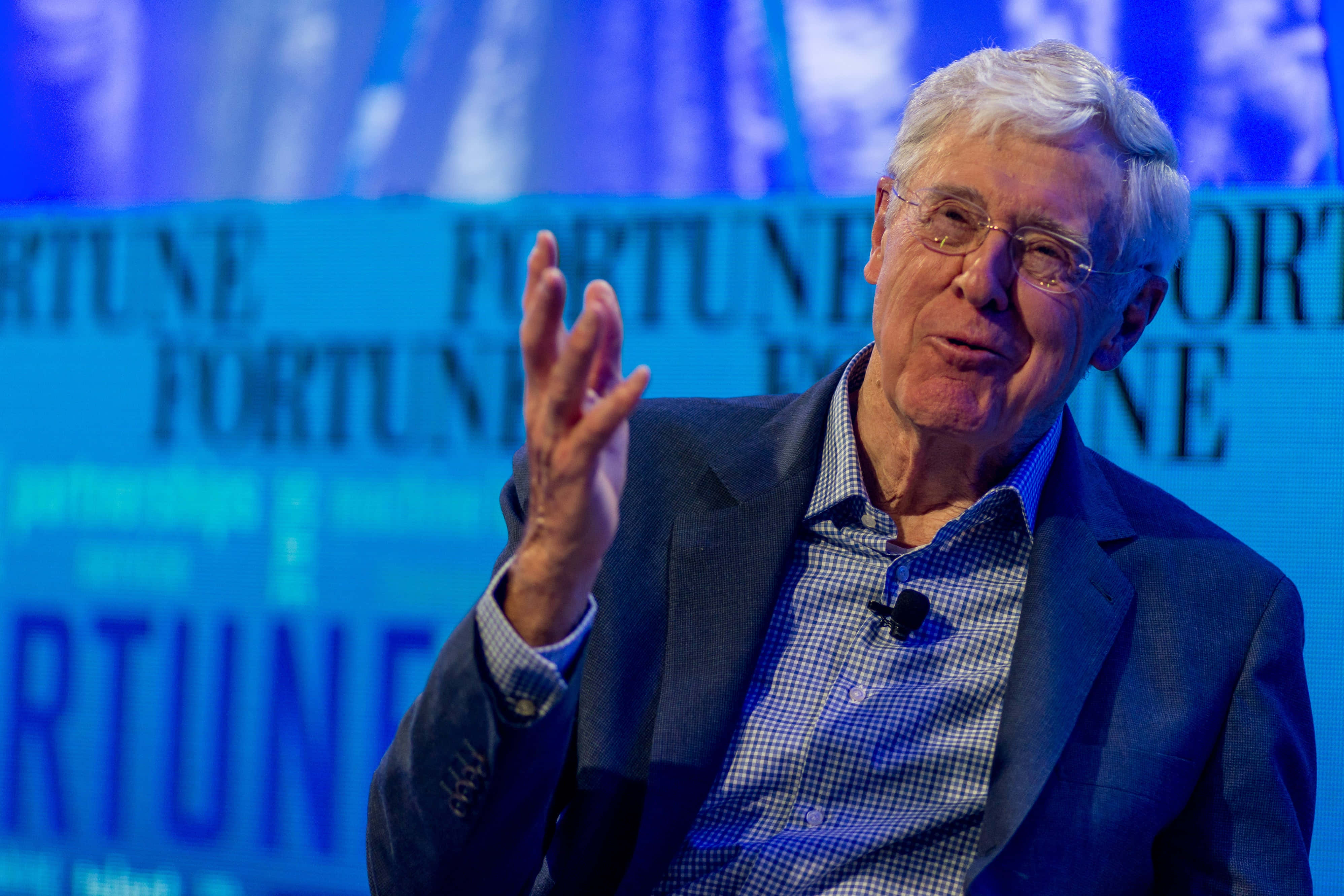 Charles G. Koch, Fortune event, blue stage lighting, 4K Desktop Wallpaper