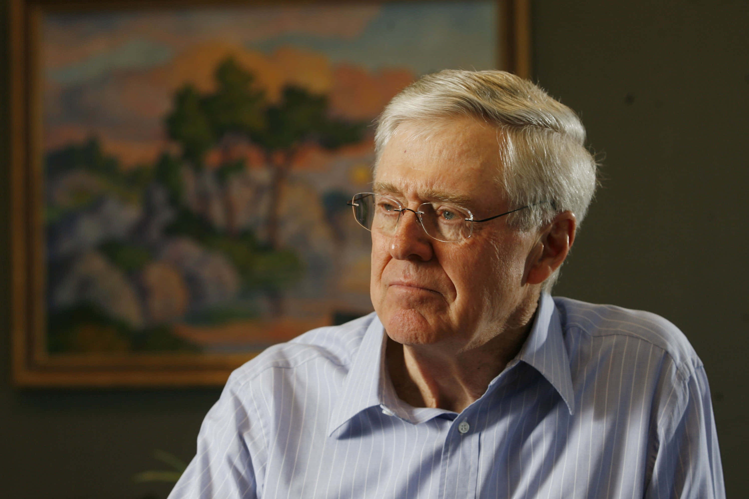 Charles G. Koch, glasses, softly lit room, 2K Desktop Wallpaper