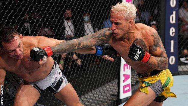 Charles Oliveira, trumping moment, raising his arms, SD Desktop Wallpaper