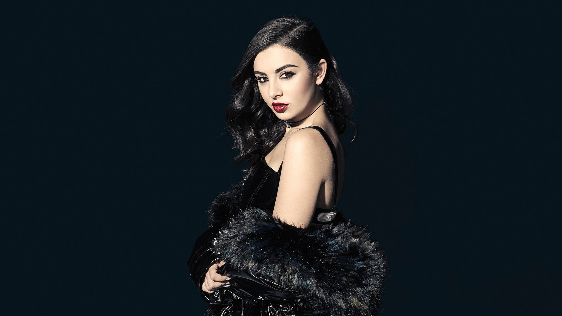 Charli Xcx, black fur-trimmed outfit, dark wavy hair, Full HD Desktop Wallpaper