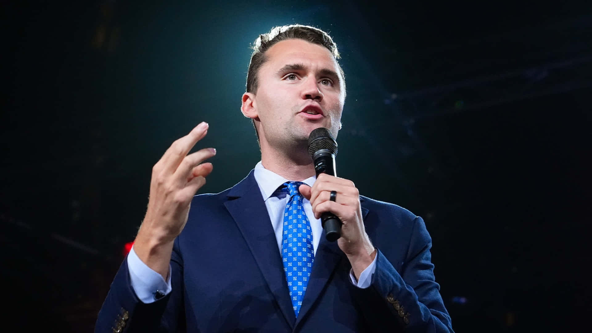 Charlie Kirk, navy suit, blue patterned tie, Full HD Desktop Wallpaper