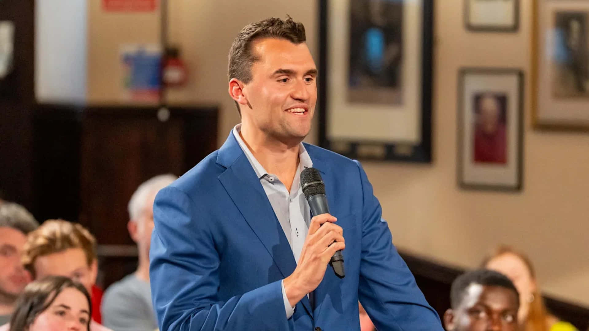 Charlie Kirk, blue suit, microphone, Full HD Desktop Wallpaper