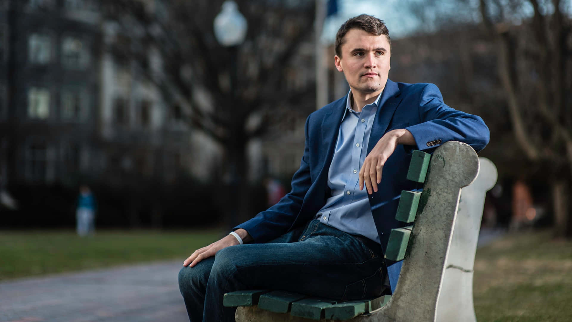 Charlie Kirk, blue blazer, green wooden bench, Full HD Desktop Wallpaper