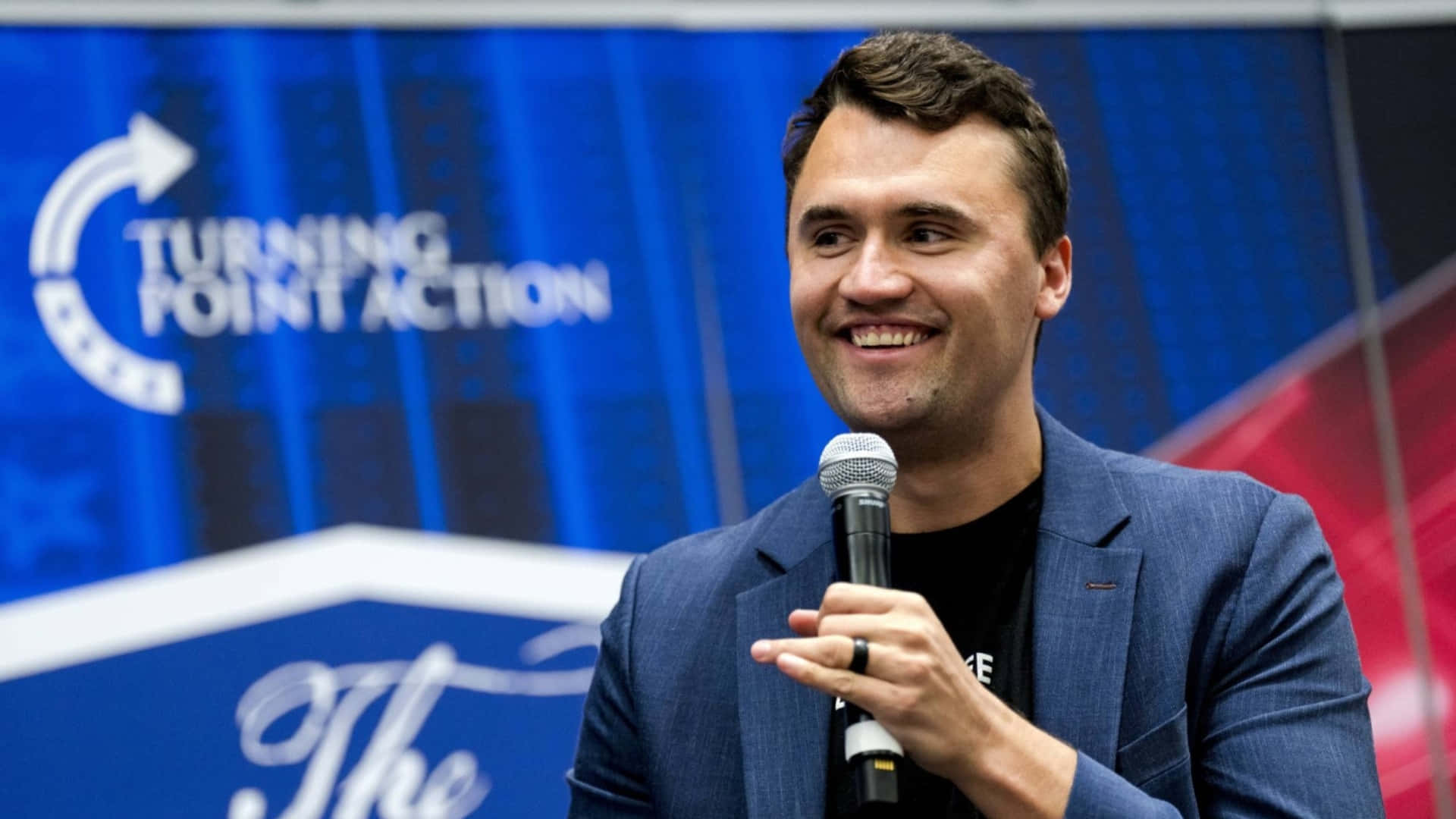 Charlie Kirk, blue blazer, microphone, Full HD Desktop Wallpaper