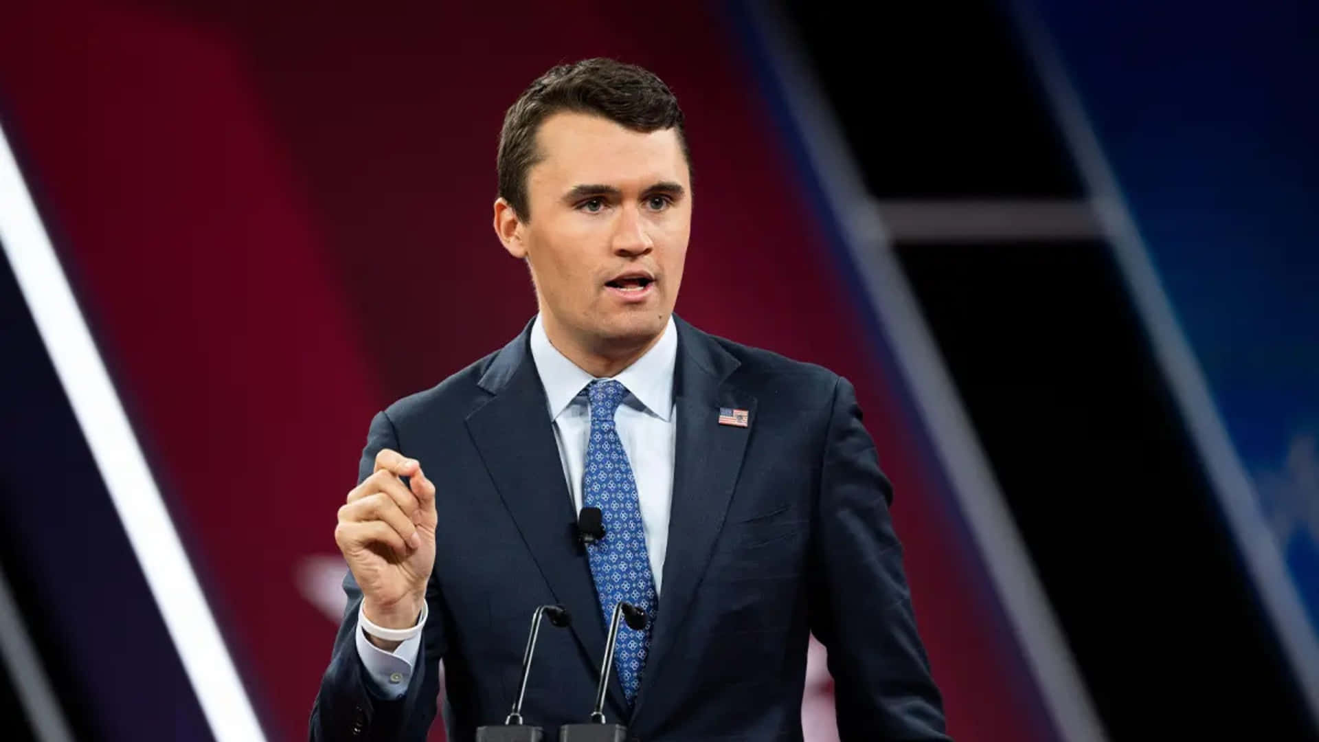Charlie Kirk, dark suit, patterned tie, Full HD Desktop Wallpaper