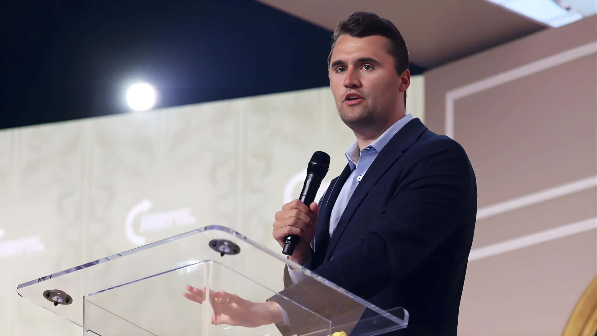 Charlie Kirk, podium, dark suit, Full HD Desktop Wallpaper