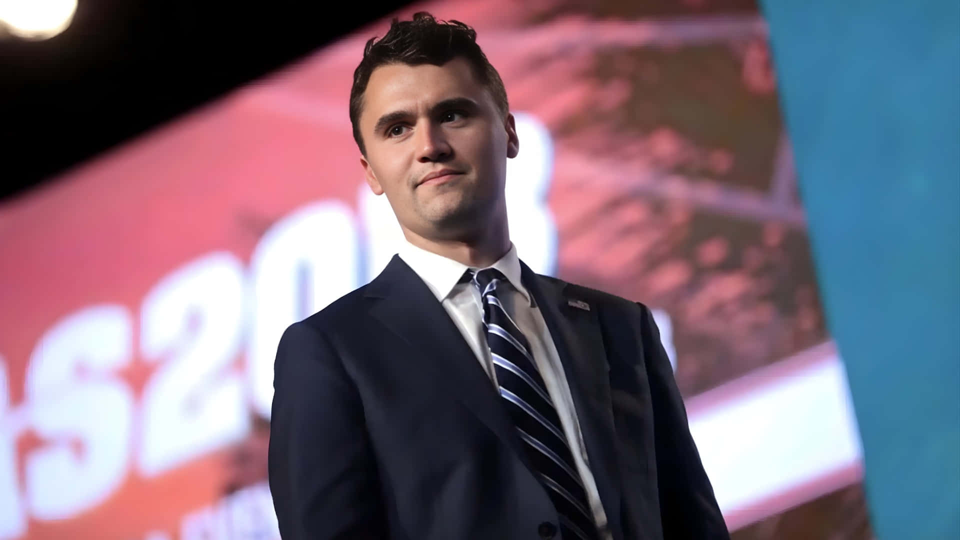 Charlie Kirk, dark suit, striped tie, Full HD Desktop Wallpaper