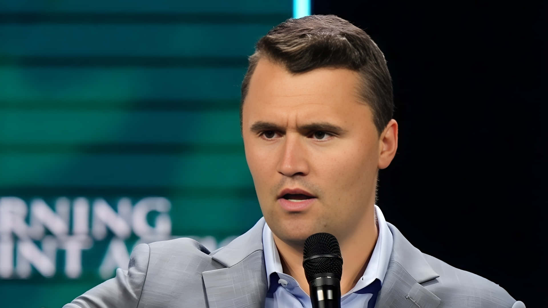 Charlie Kirk, gray suit, microphone, Full HD Desktop Wallpaper