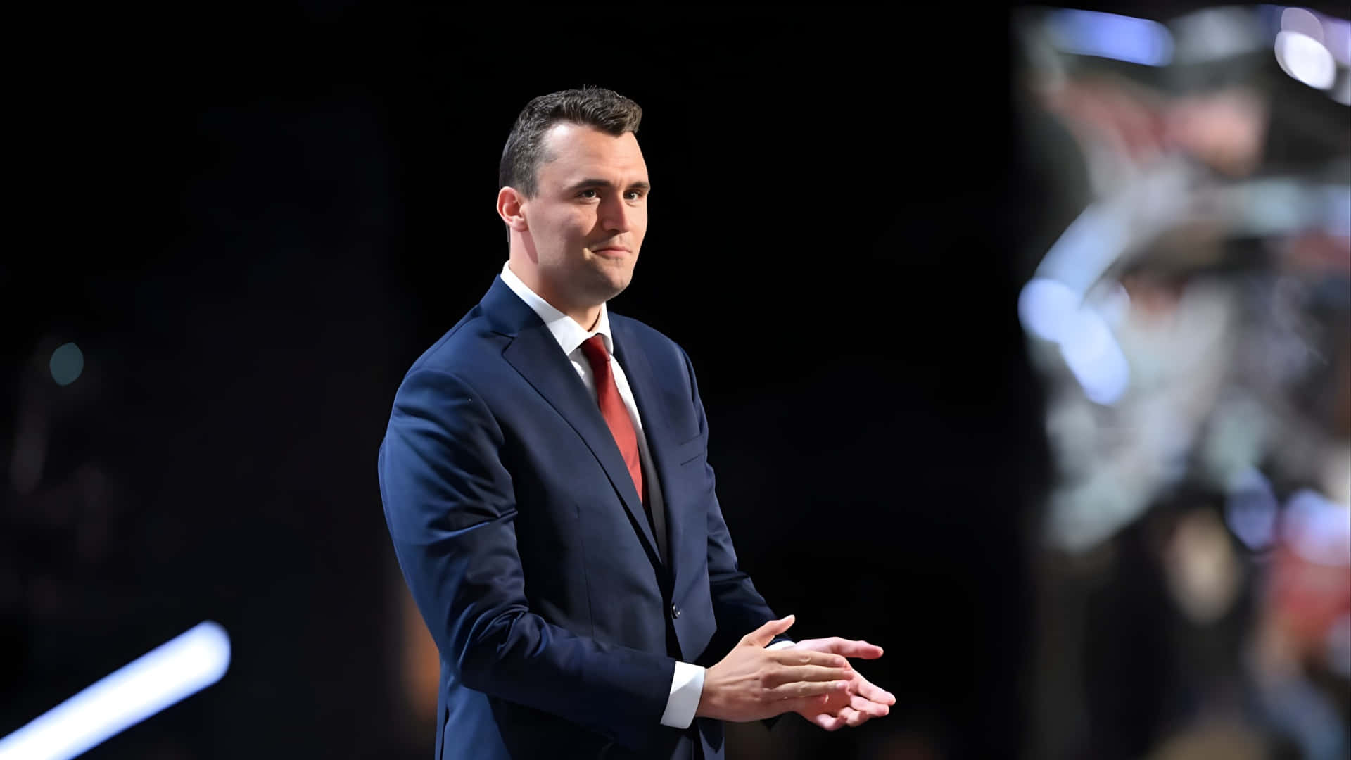 Charlie Kirk, dark blue suit, red tie, Full HD Desktop Wallpaper