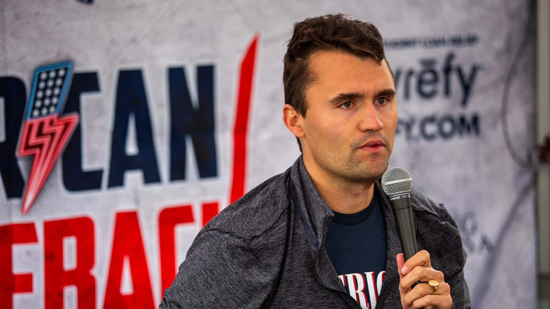 Charlie Kirk, microphone, banner, Full HD Desktop Wallpaper