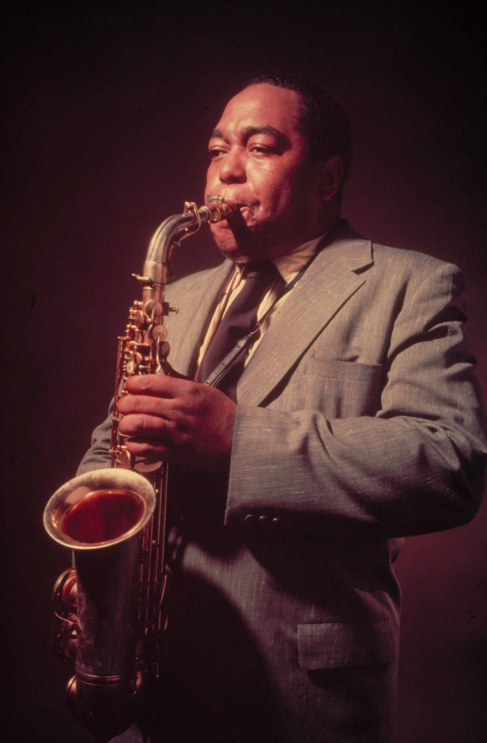 Charlie Parker, golden saxophone, suit, 2K Phone Wallpaper