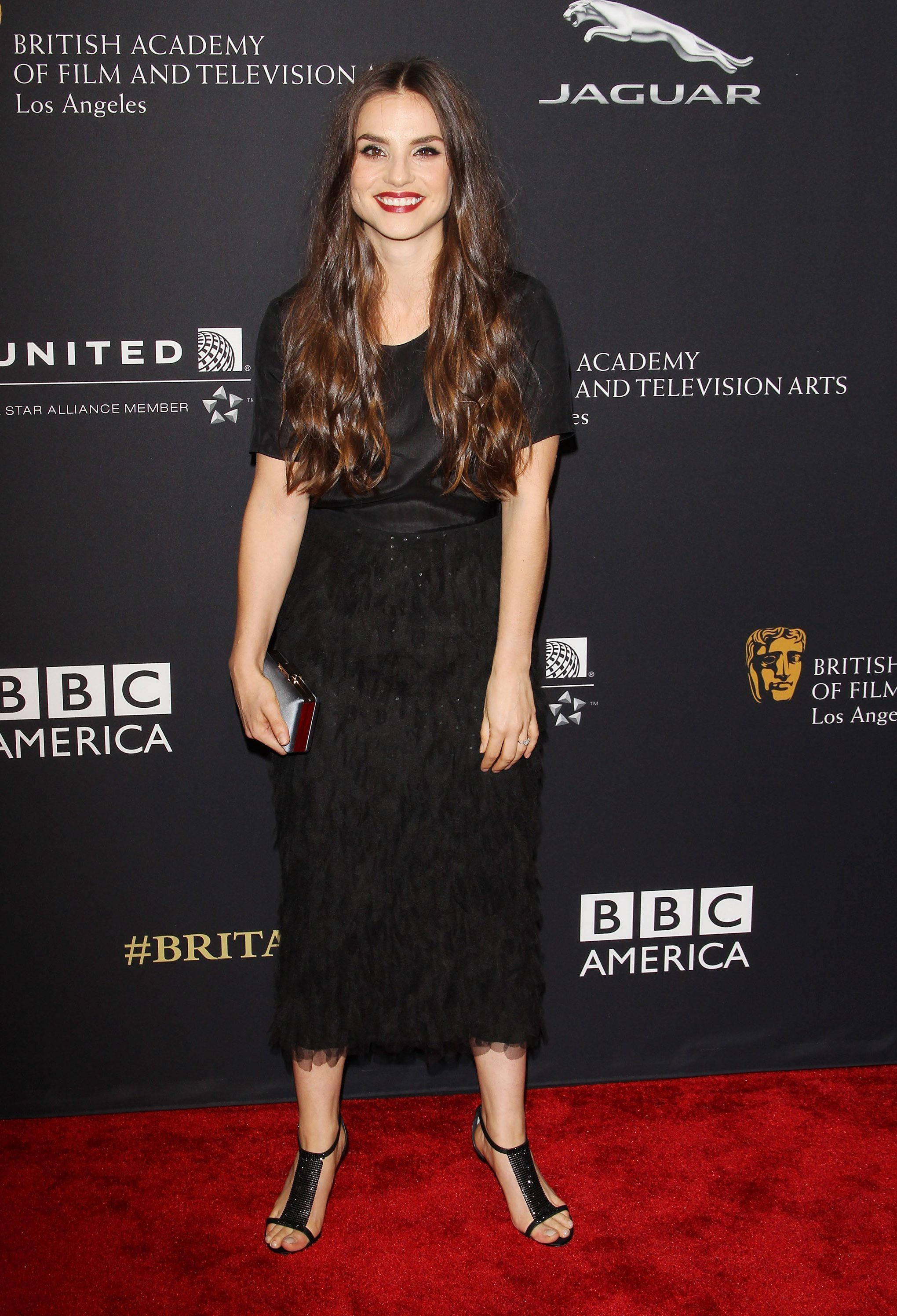 Charlotte Riley, black feathered dress, red carpet, 2K Phone Wallpaper
