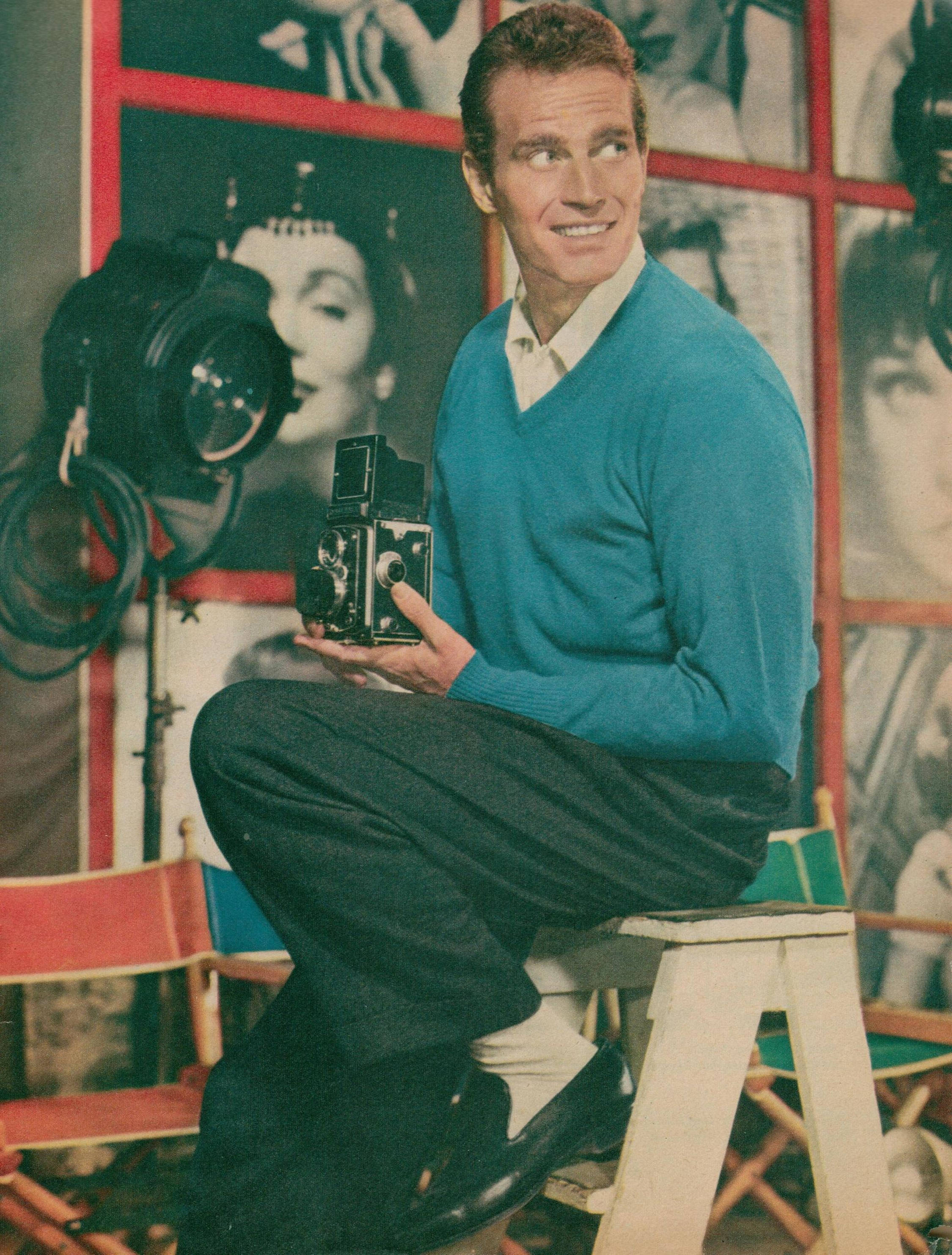 Charlton Heston, stool, blue sweater, 2K Phone Wallpaper