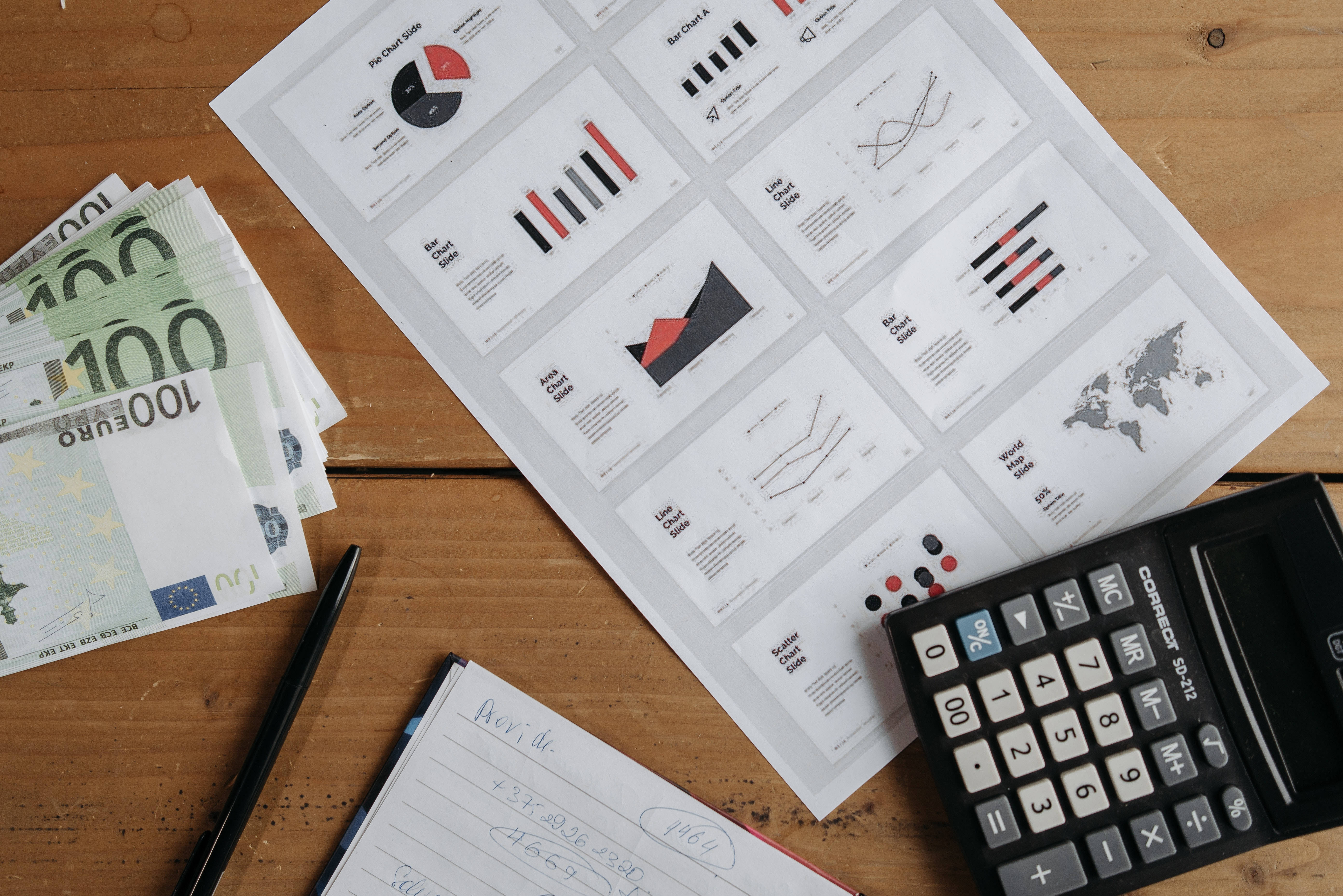 Chartered Accountant, black graphs, wooden desk, 5K Desktop Wallpaper