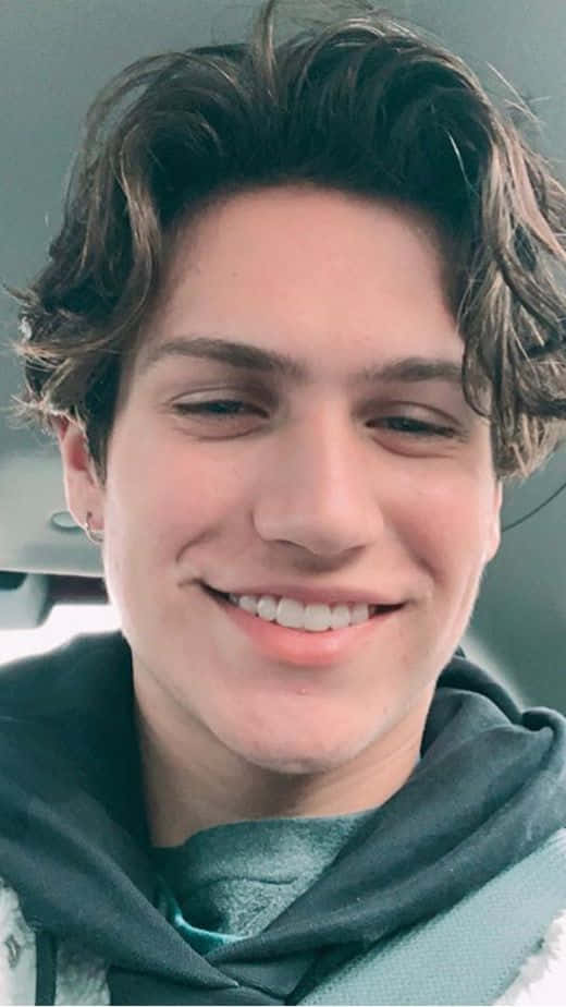 Chase Hudson, teal hoodie, wavy brown hair, SD Phone Wallpaper