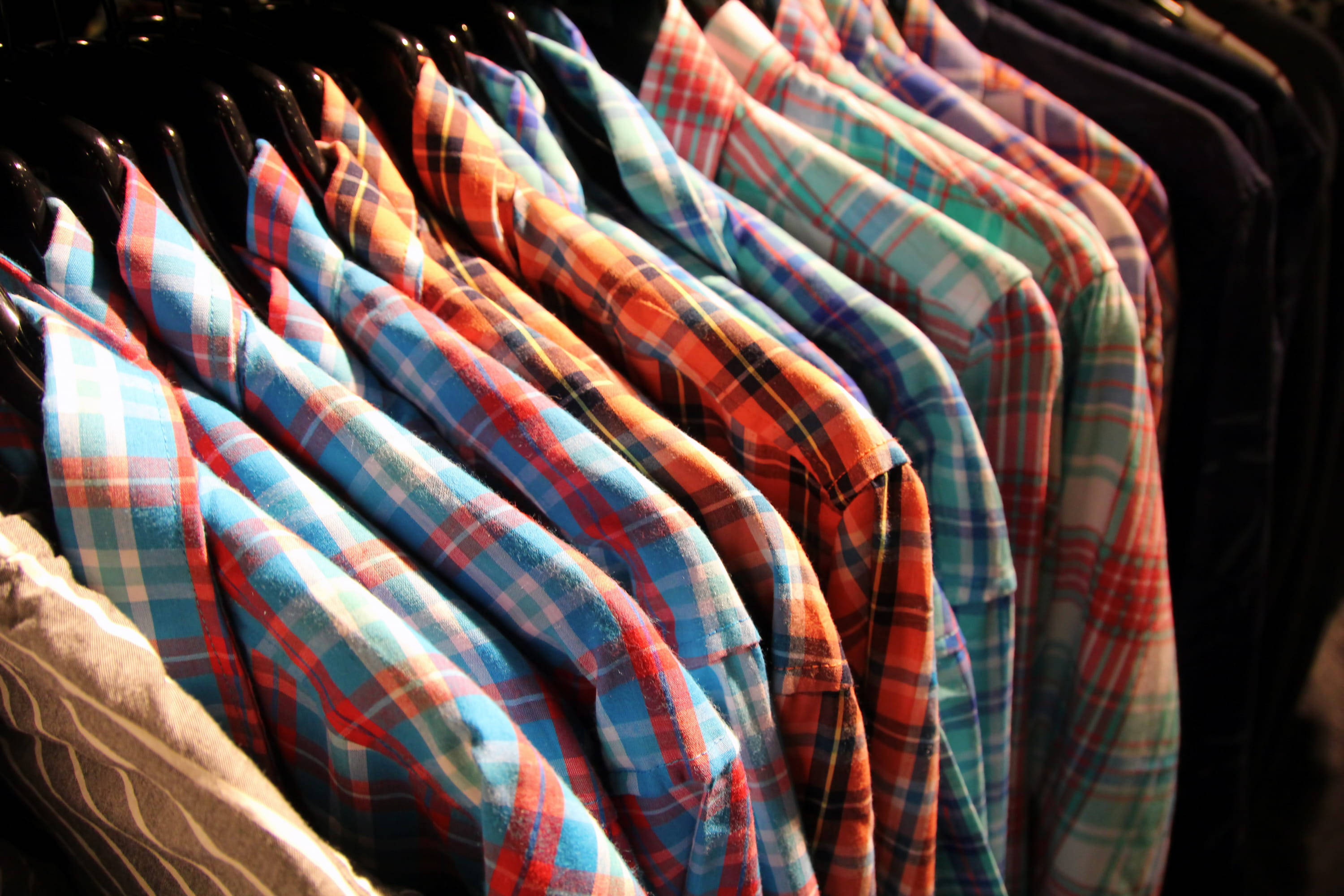 checkered clothes, colorful plaid shirts, black hangers, 2K Desktop Wallpaper