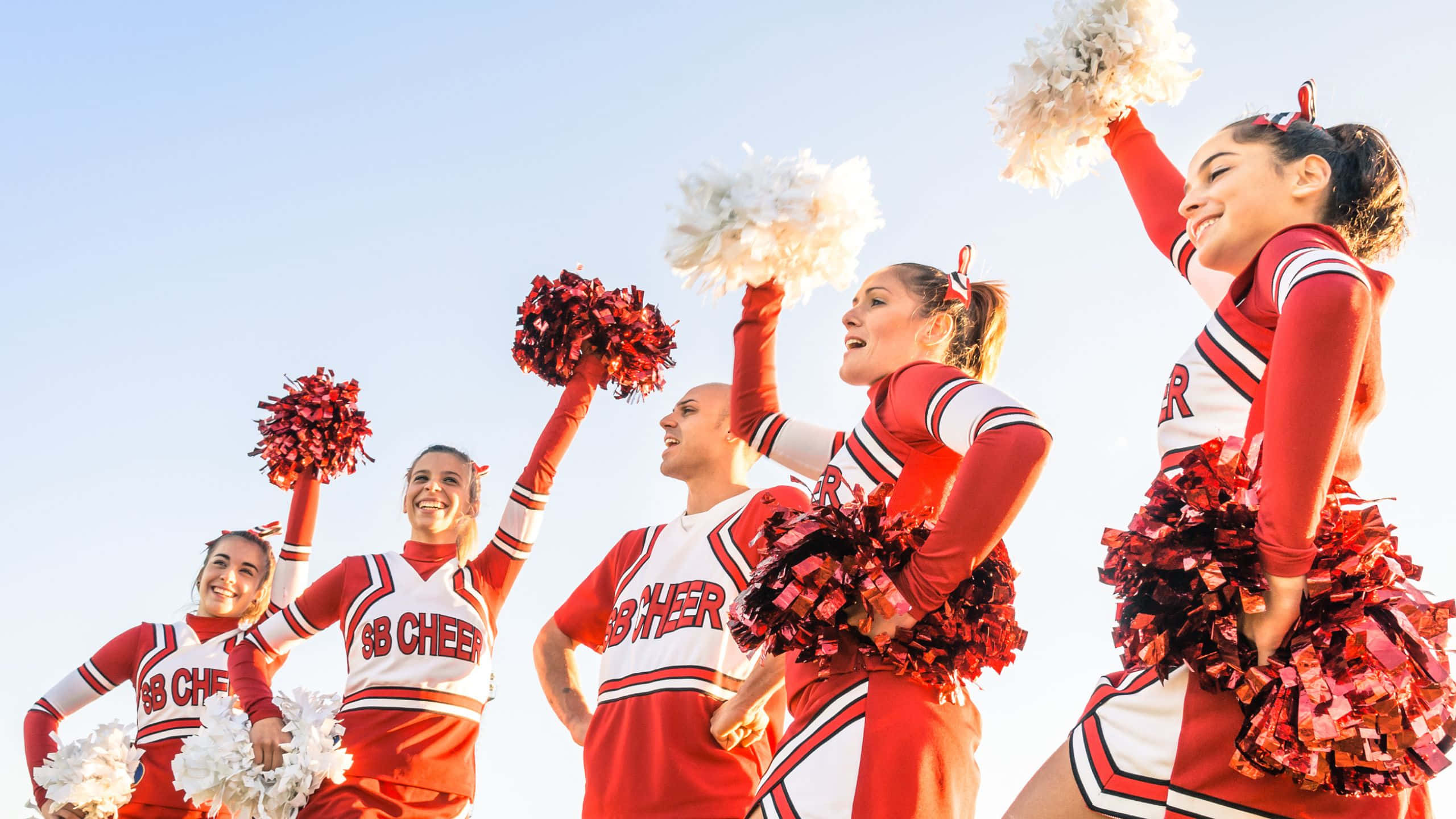 high school cheerleading team, red and white uniforms, pom-poms, 2K Desktop Wallpaper