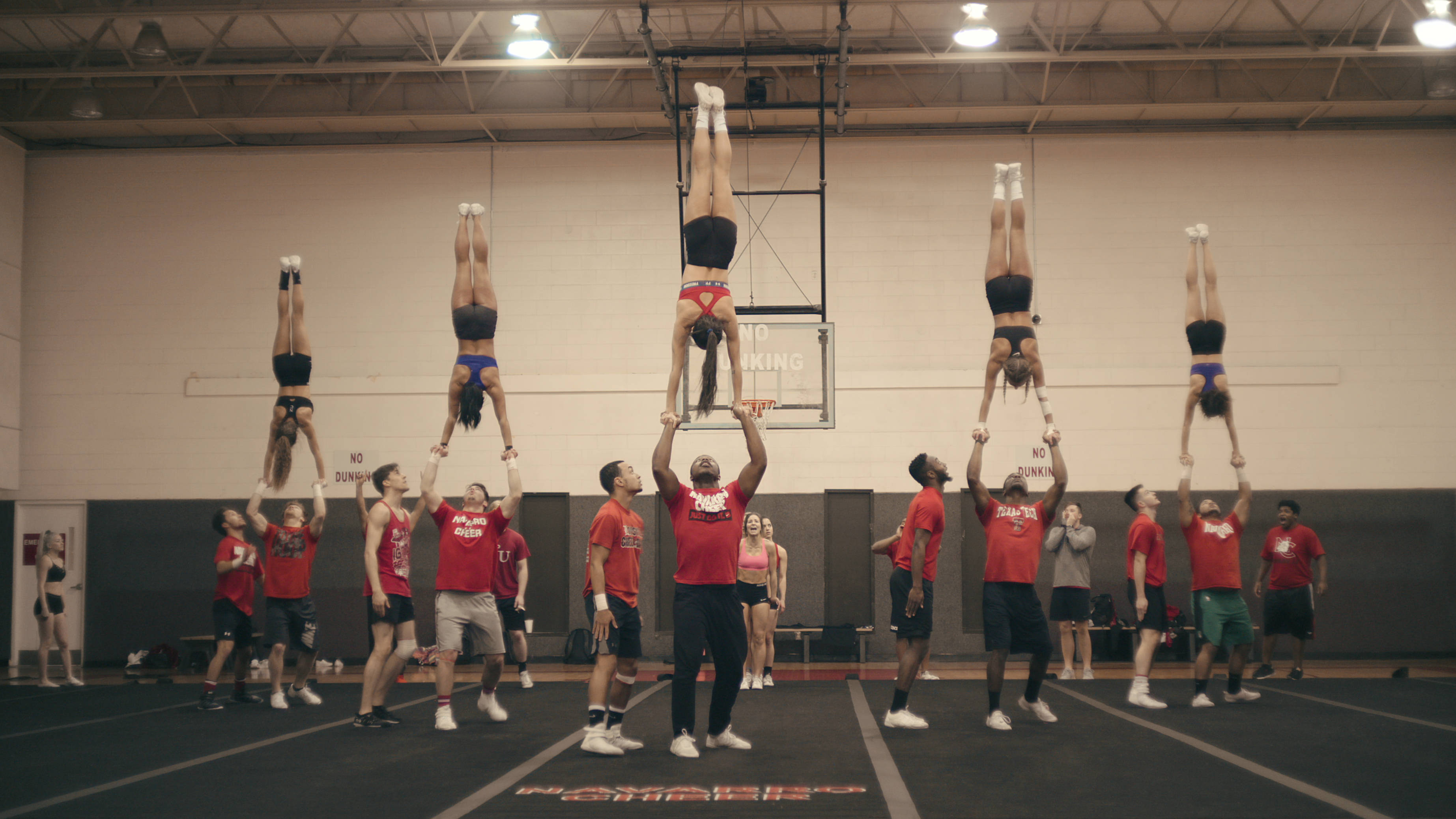 hand in hand cheerleading, synchronized handstands, teammates' hands, 2K Desktop Wallpaper