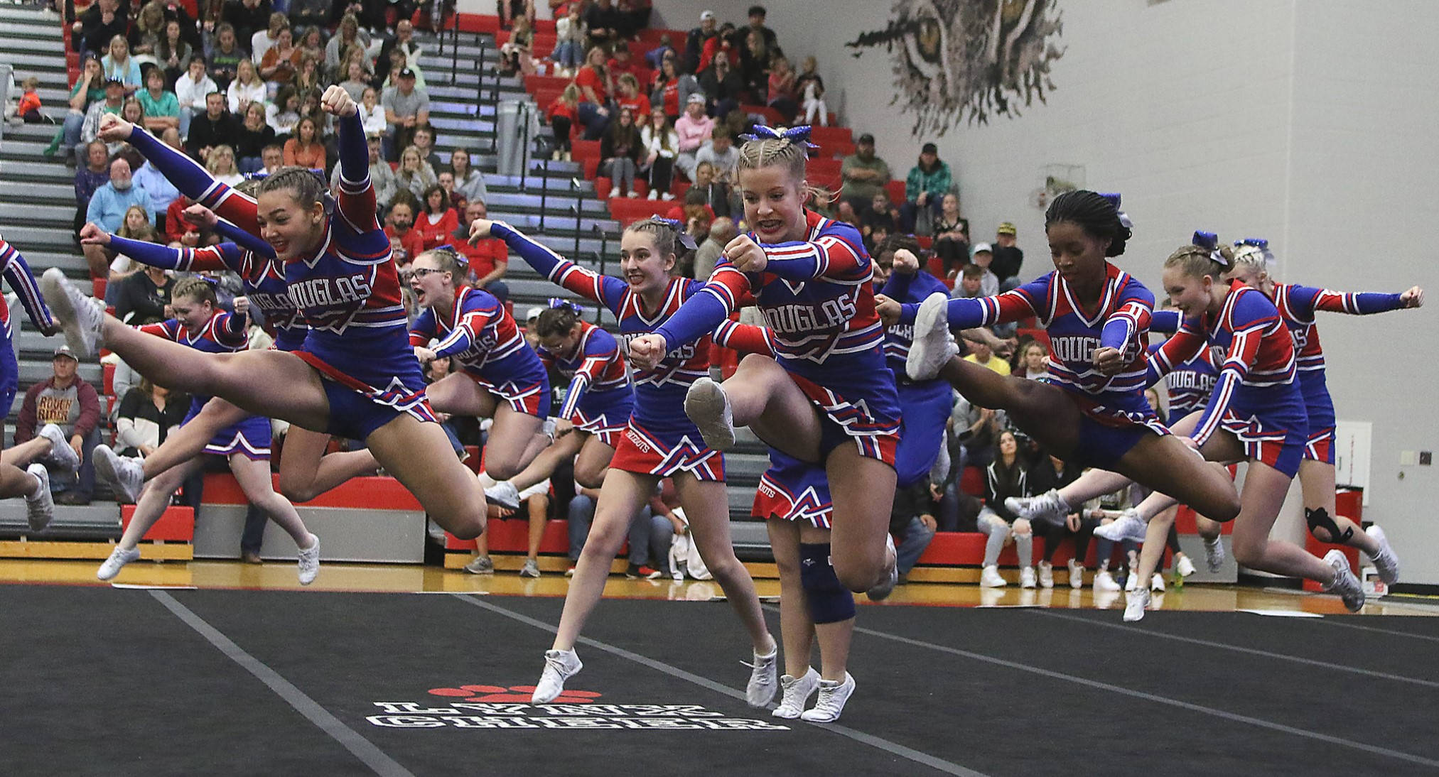 Cheerleading Jump, blue red and white uniforms, gymnasium floor, Full HD Desktop Wallpaper