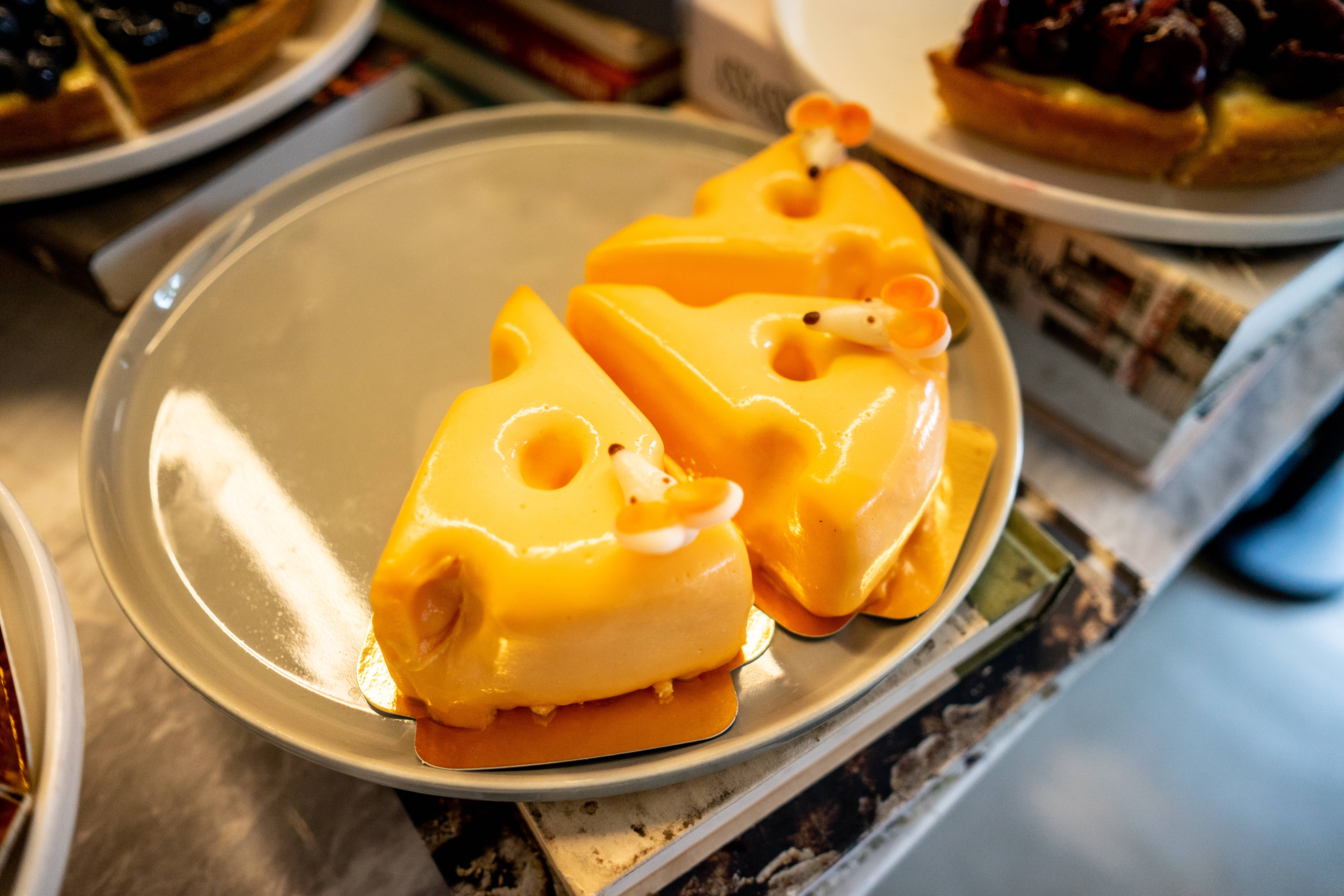 cute mouse cheese cake, glossy yellow cheese-shaped pastries, tiny mouse decorations, 5K Desktop Wallpaper